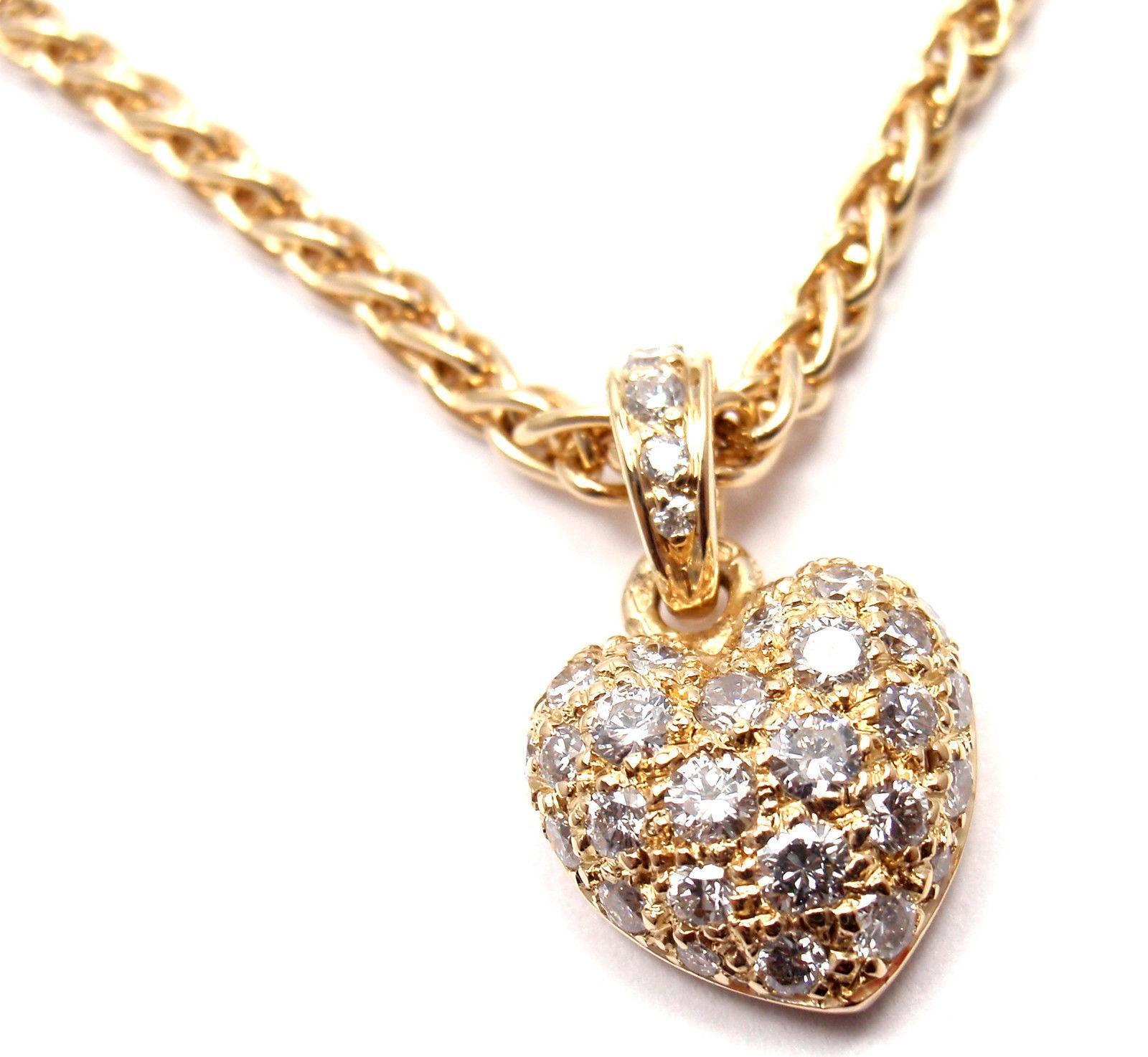 18k Yellow Gold Diamond Heart Pendant Necklace by Cartier.
With 34 round brilliant cut diamonds total weight approx 1ct. 
Diamonds VS1 clarity, E color

Details:
Chain Length: 16.5