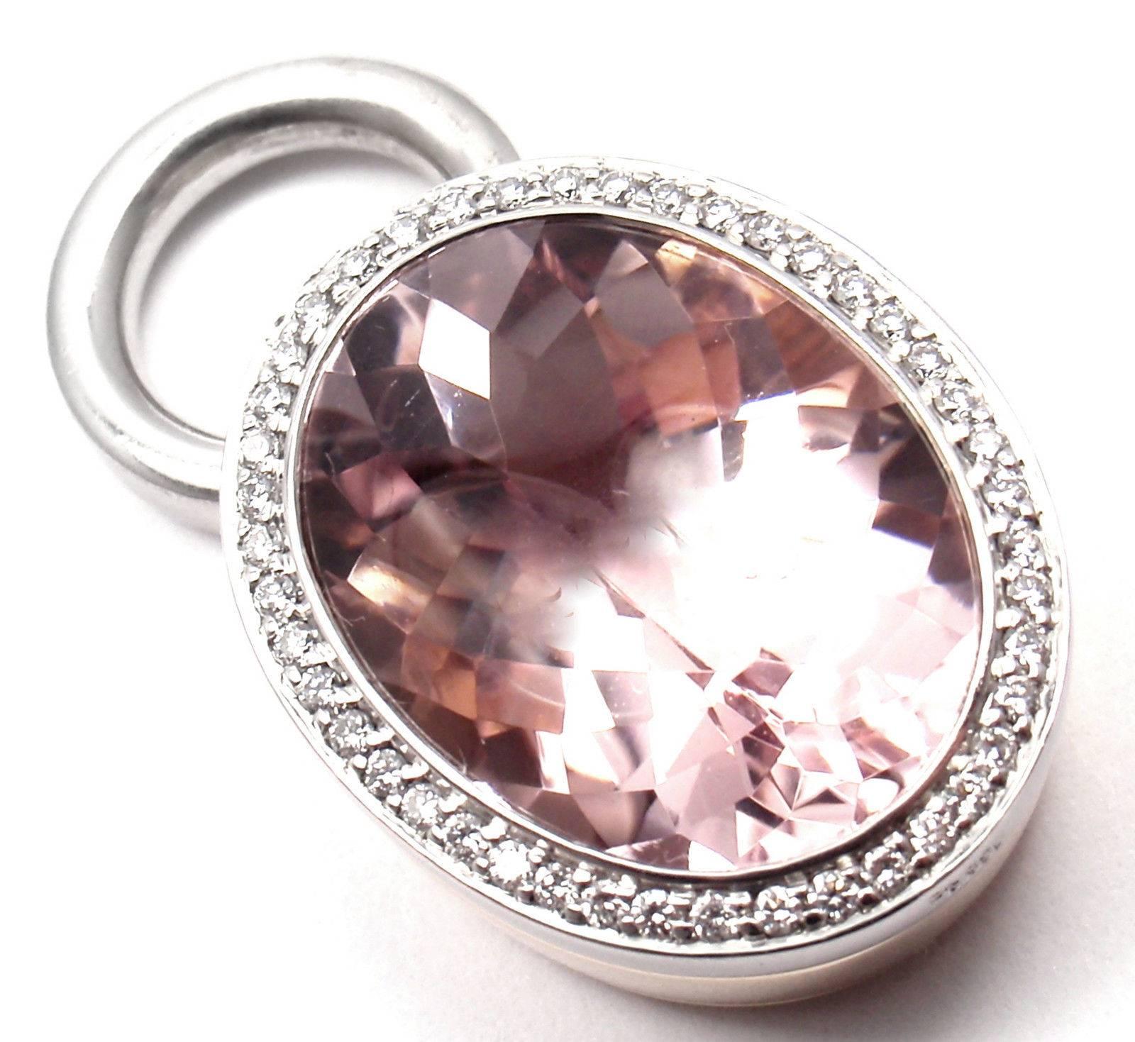 18k Rose Gold And Platinum Large Kunzite Diamond  Pendant by Jochen Pohl.
With 50 round brilliant cut diamonds VS2 clarity G color total weight approx. .50ct
1 large oval Kunzite 21mm x 16mm

Details:
Measurements: 35mm x 20mm
Weight:  30.3