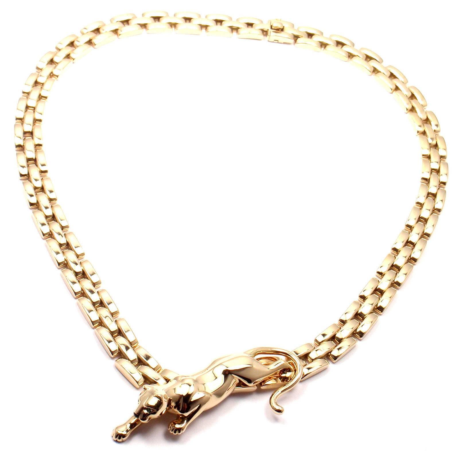 18K Yellow Gold Panthere Panther 3 Row Maillon Necklace by Cartier.  
With an adorable Panther with black onyx nose and 
2 cute green emerald eyes.  
This necklace comes with its original Cartier box.  
Panther Details:  Length: 2