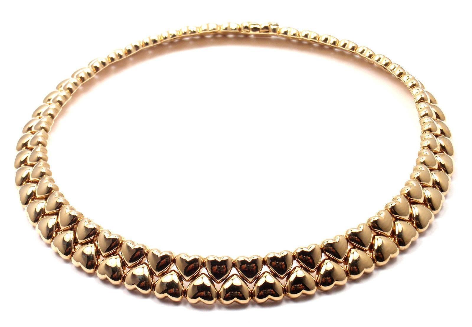18k Yellow Gold Heart Choker Necklace by Cartier. 
This beautiful necklace comes with its original Cartier box. 

Details: 
Weight: 83.3 grams
Length: 16