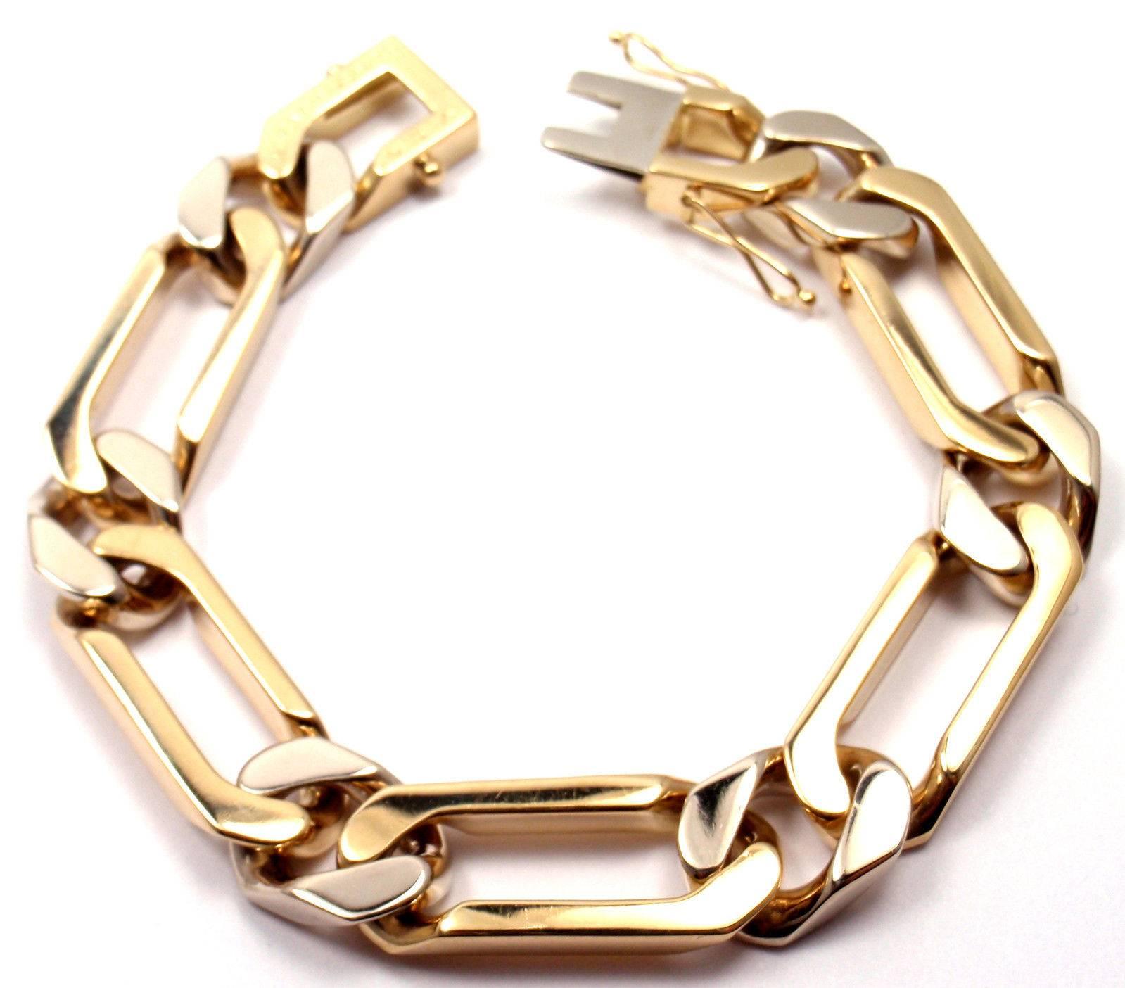 18k Yellow And White Gold Heavy Link Bracelet by Van Cleef & Arpels.

Details:
Length: 7 3/4