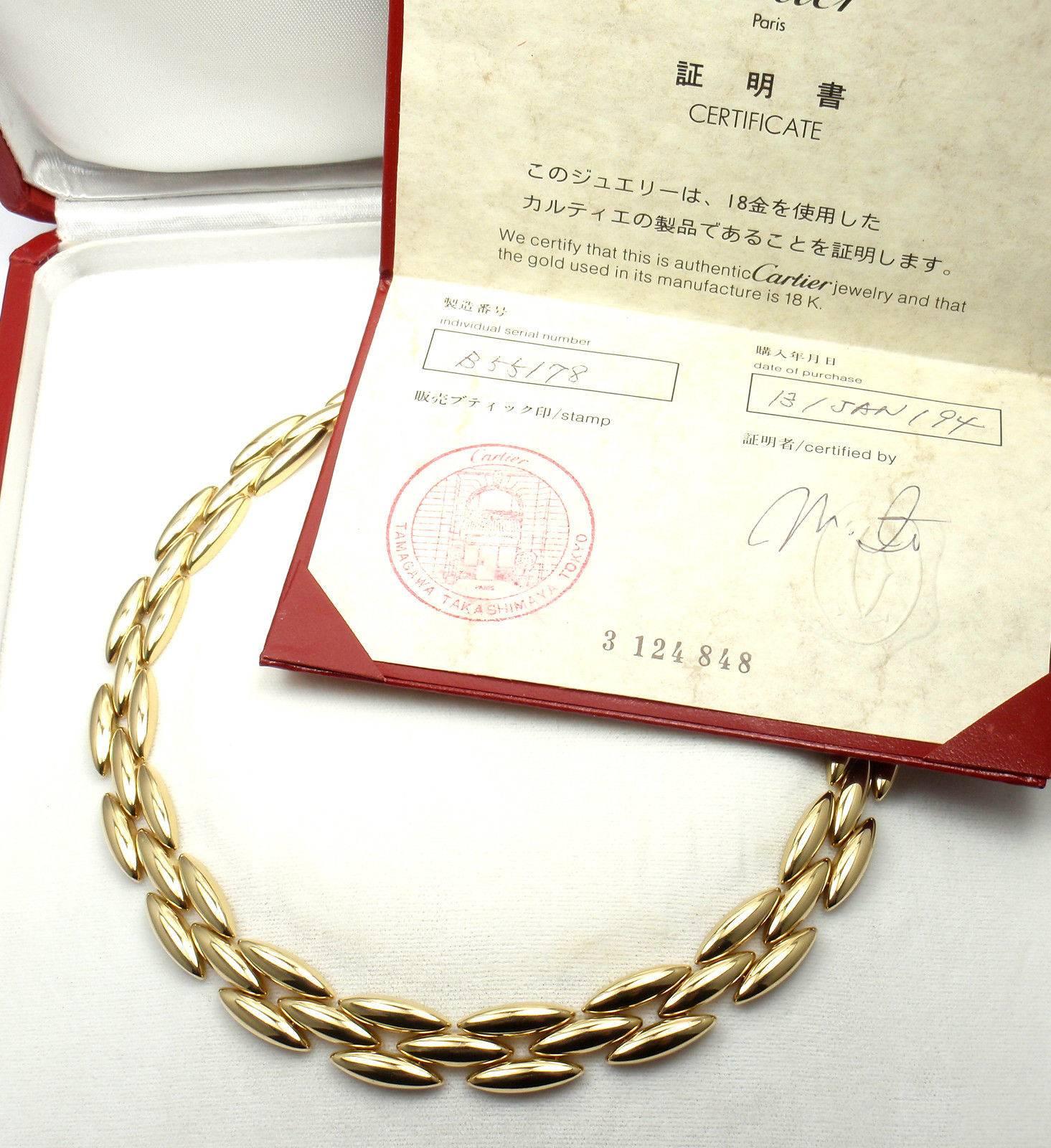 18k Yellow Gold Gentiane 3 Row Rice Link Necklace by Cartier. 
This beautiful necklace comes with an original Cartier box and Cartier certificate.

Details: 
Length: 15.5