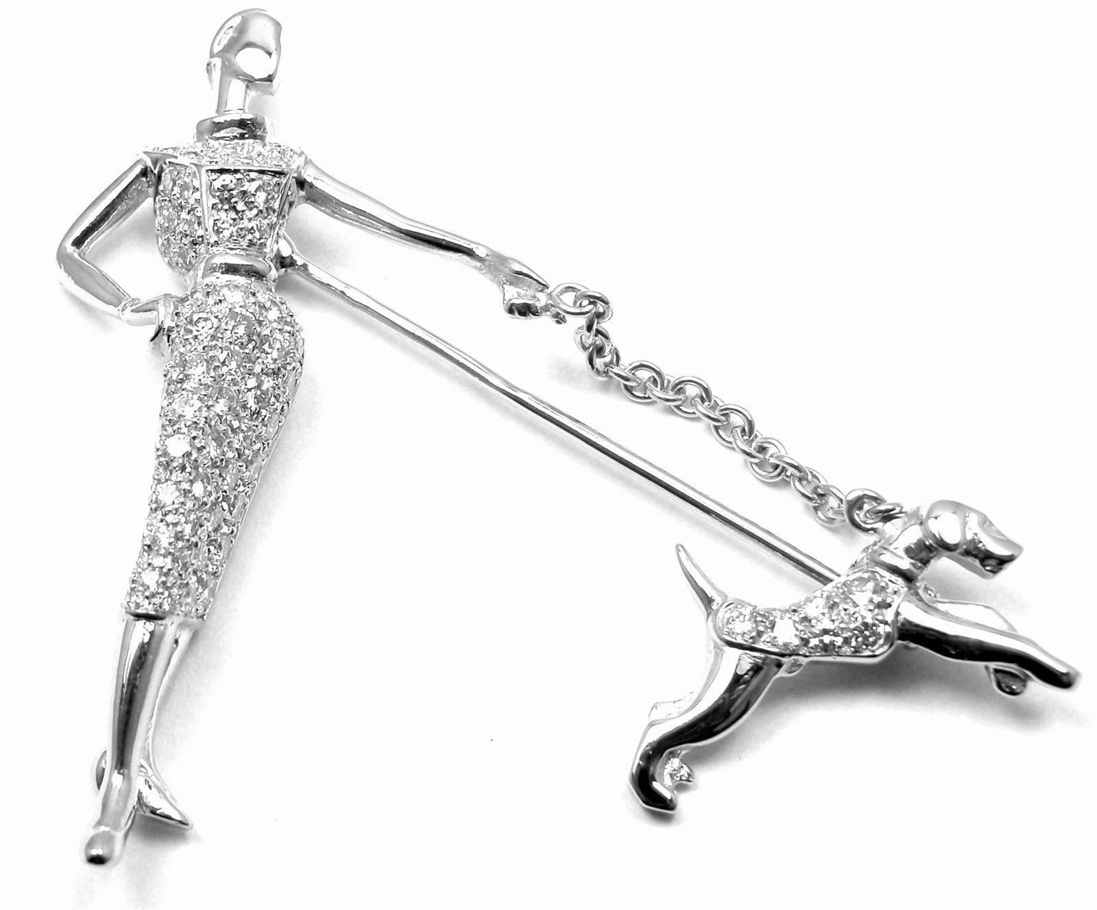 Absolutely Stunning & Gorgeous! Platinum Diamond Lady Walking a Dog Brooch Pin by Van Cleef & Arpels. 
With 68 round brilliant cut diamonds VVS1 clarity, E color total weight approx. 1ct. 
This rare VCA brooch comes with Van Cleef & Arpels service