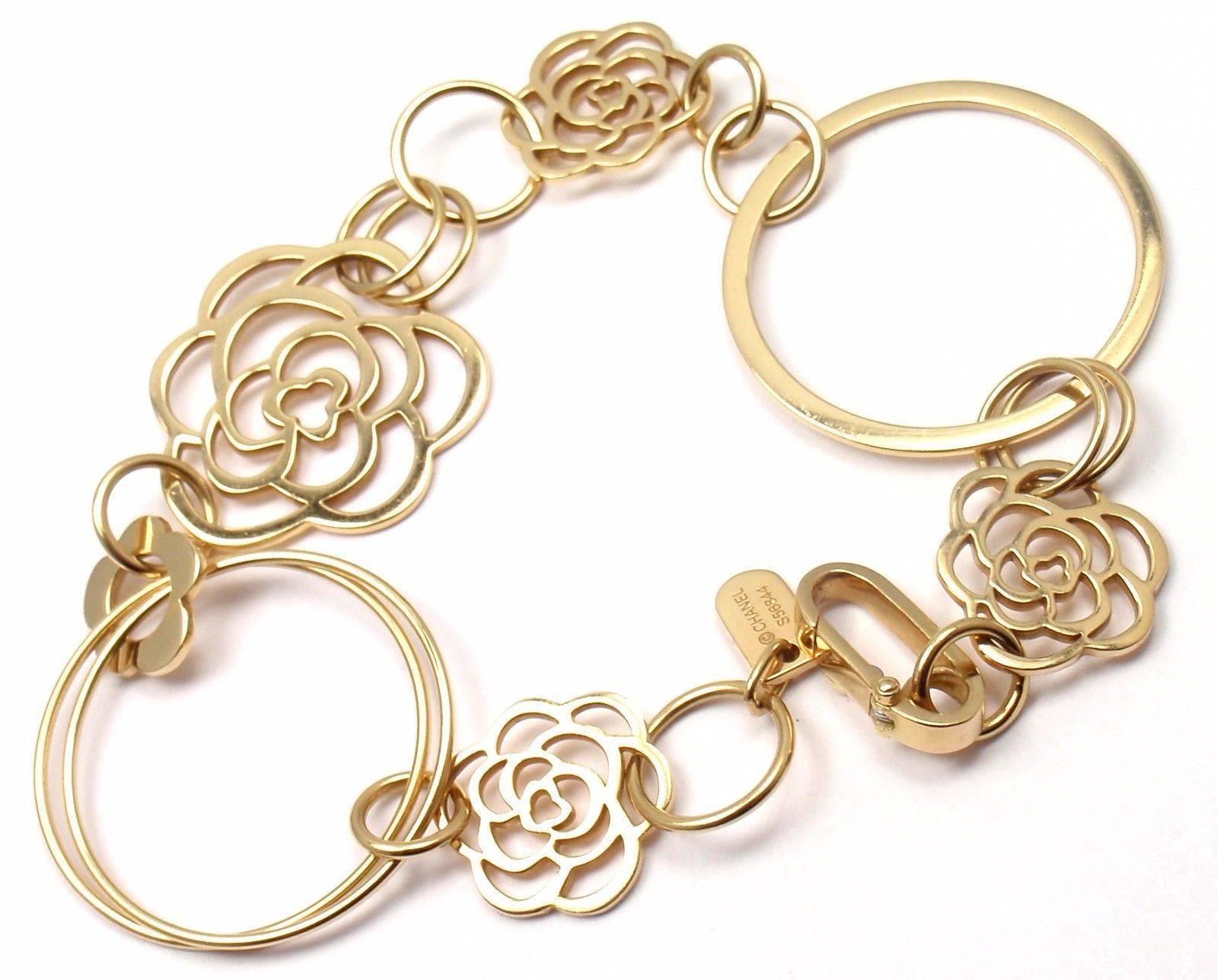 18k Yellow Gold Camelia Camellia Flower Link Bracelet by Chanel. 

Details: 
Length: 7