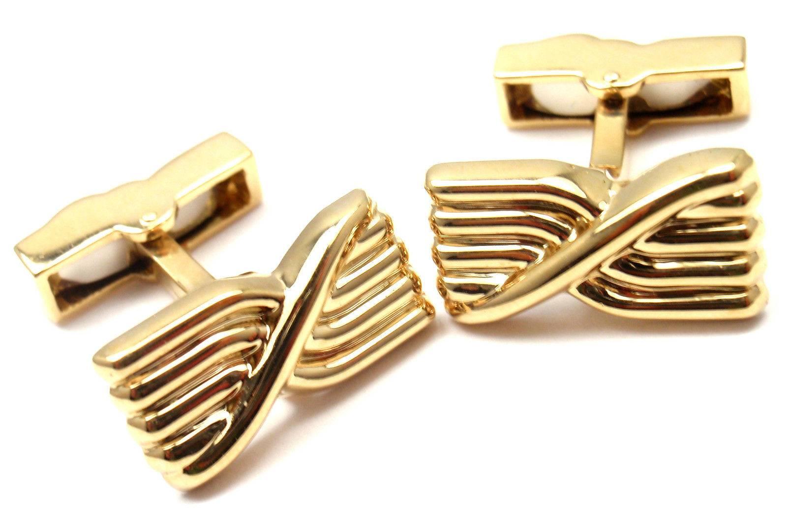 18k Yellow Gold Cufflinks by Tiffany & Co.  

Details: 
Measurements: 19mm x 10mm x 23mm
Weight: 18.3 grams 
Stamped Hallmarks: Tiffany & Co. 750

*Free Shipping within the United States*  
YOUR PRICE: $2,500
T898nmd