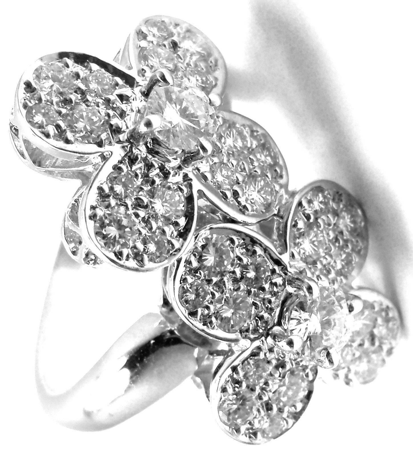 18k White Gold Diamond Double Trefle Clover Flower Ring by Van Cleef & Arpels. 
With 34x Diamonds VVS1 clarity, E color total weight approx. 1.5ct  
Details: 
Size: 5 (resizing is available)
Width: 22mm 
Weight: 6.5 grams
Stamped Hallmarks: