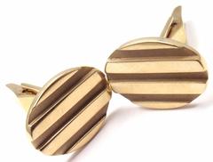 Tiffany & Co. Grooved Oval Gold Cufflinks