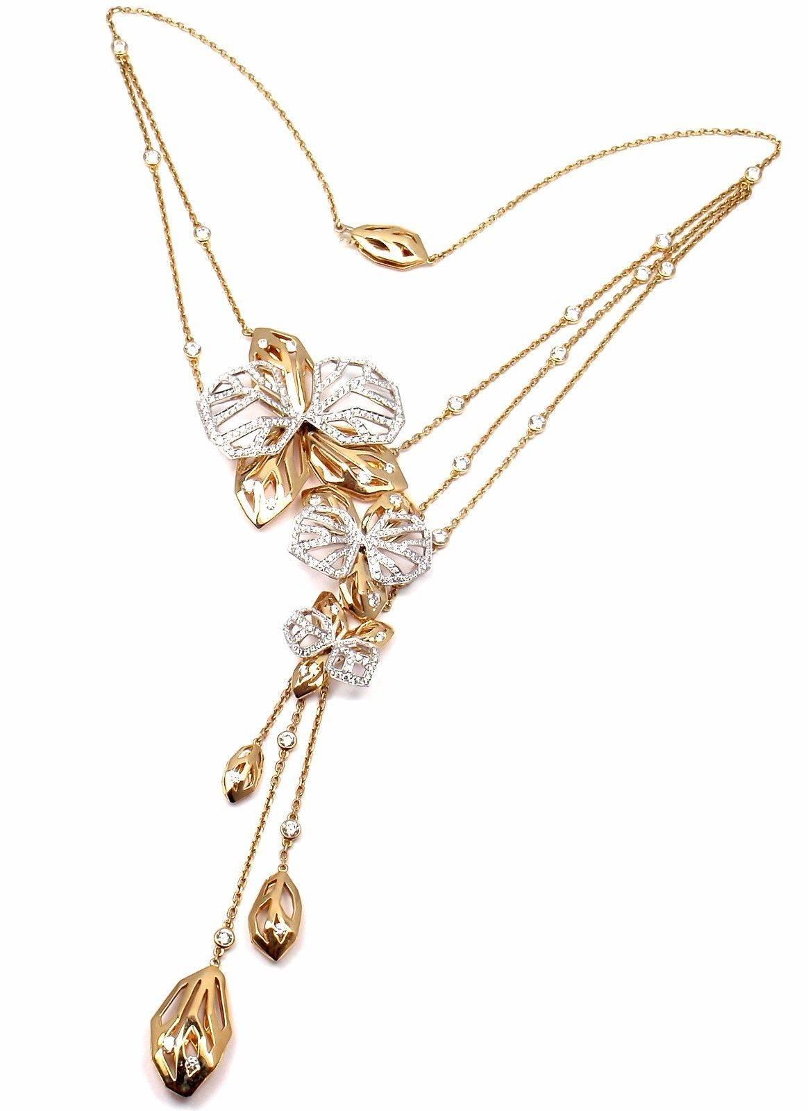 18k White And Yellow Gold Diamond Caresse D'orchidées Orchid Flower Necklace by Cartier. 
With 325 Round Brilliant Cut Diamonds VVS1 clarity, E color 
This necklace is in mint condition and it comes with original Cartier box and Cartier service