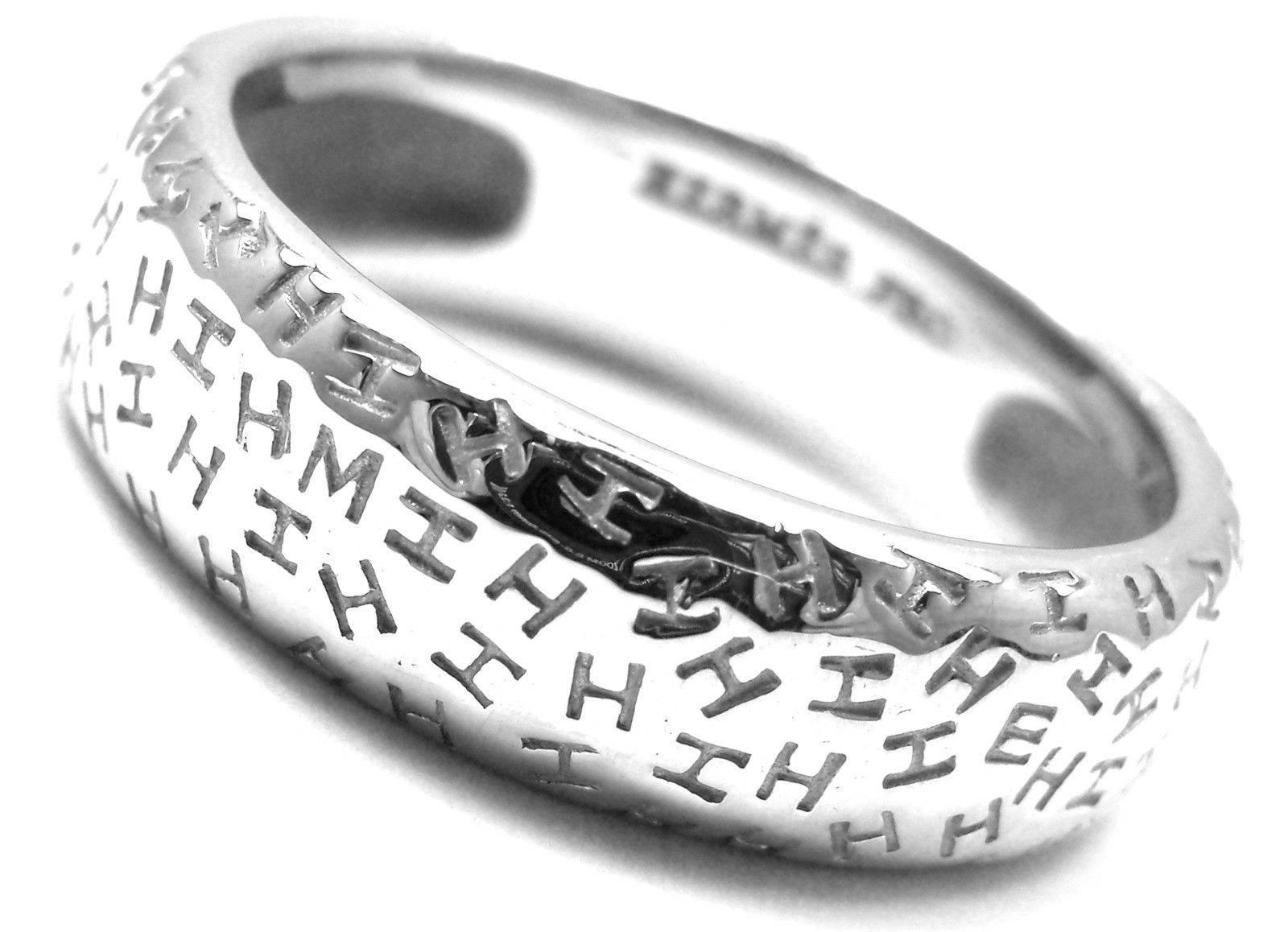 18k White Gold Graffiti H Band Ring by Hermes.

Details: 
Ring Size: European 59 US 8 3/4
Weight: 10.1 grams
Width: 7mm
Stamped Hallmarks: Hermes Au750 59 47350
*Free Shipping within the United States*

YOUR PRICE: $1,200

T1126rmd