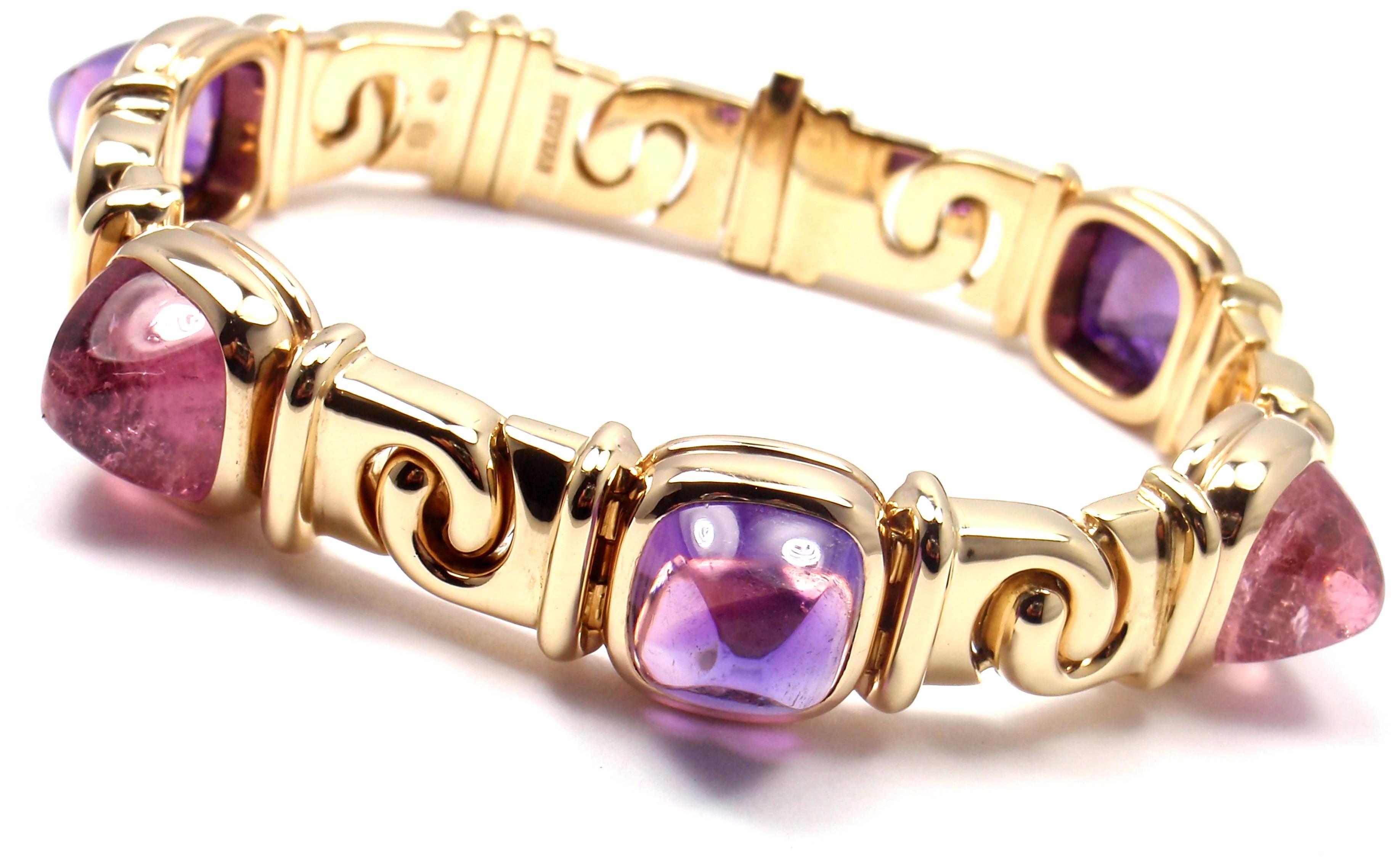 18k Gelbgold Amethyst Rosa Turmalin Sugarloaf Cabochon Link Armband von Bulgari. 
Mit 3 Zuckerhut-Cabochon Amethysten 10mm x 13mm
2 Zuckerhut-Cabochon Rosa Turmaline 10mm x 13mm
Dieses Armband wird mit Bulgari-Box. 

Einzelheiten: 
Länge: 7