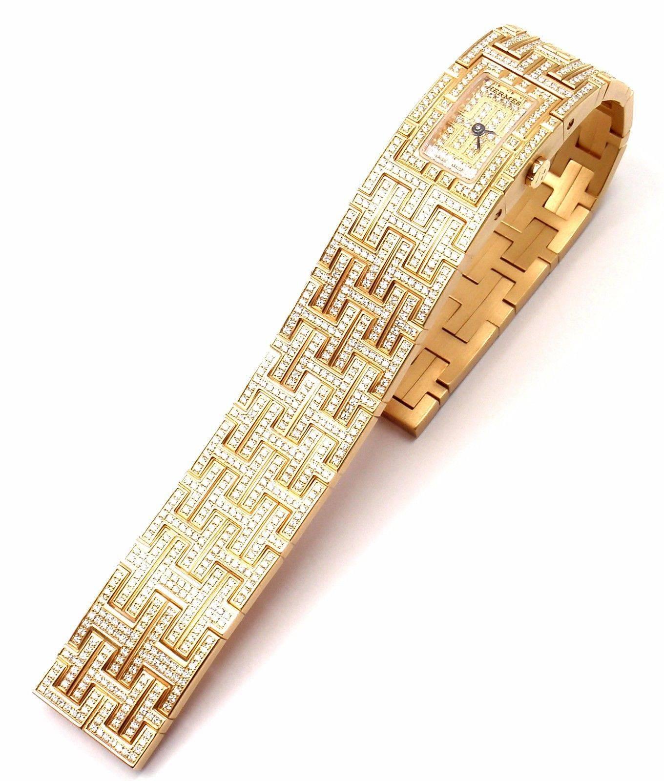 18k Yellow Gold Diamond Bracelet Kilim Watch by Hermes.  
This watch comes with original Hermes box and all the papers including a tag for $58,000 from 2007.
Certificate of authenticity from 5/9/2007.
With 1076 Round brilliant cut diamonds VVS1