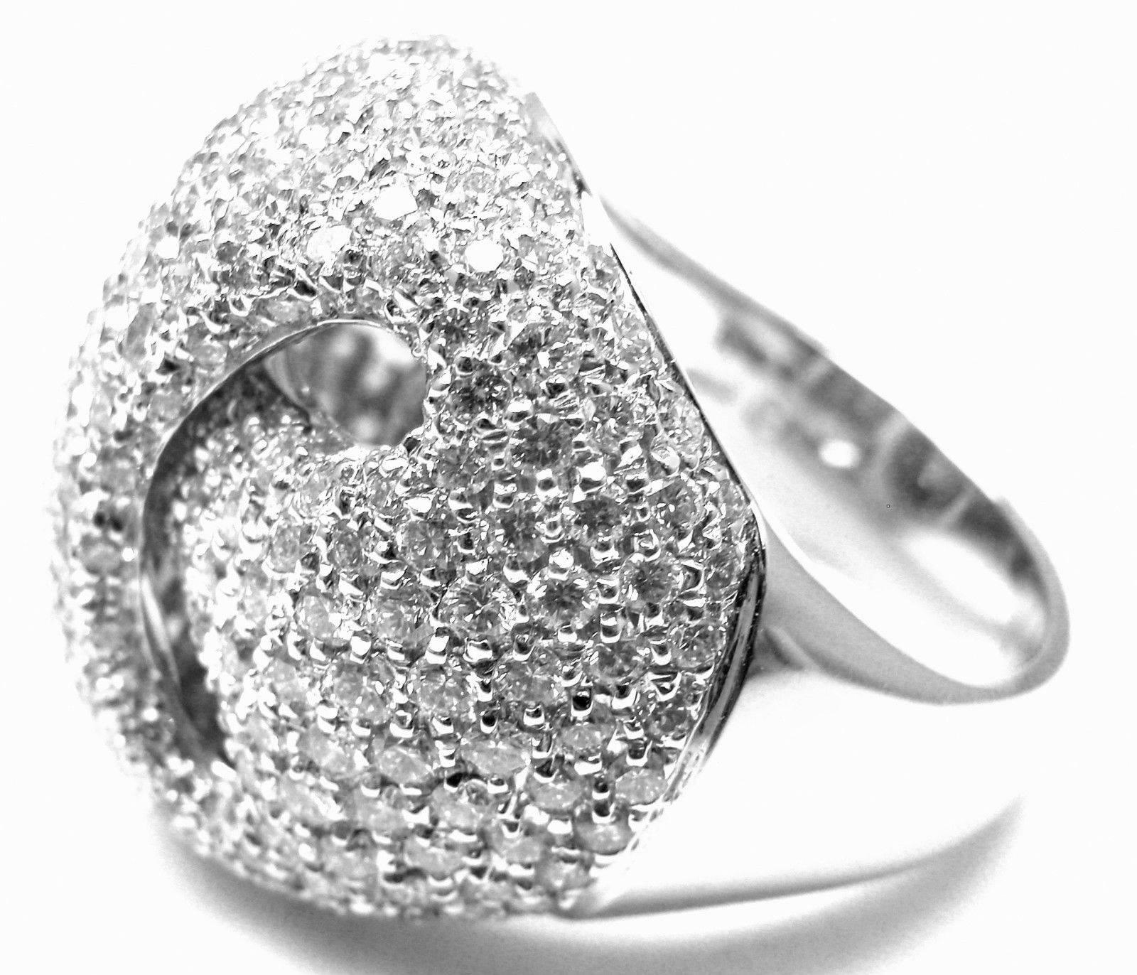 18k White Gold Diamond Large Ring by Damiani.
With round brilliant cut diamonds total weight approx 3.21ct VS2 clarity, G color
This ring comes with Box, Certificate.

Details:
Size:  7
Width: 21mm
Weight:  17.9 grams
Stamped Hallmarks:
