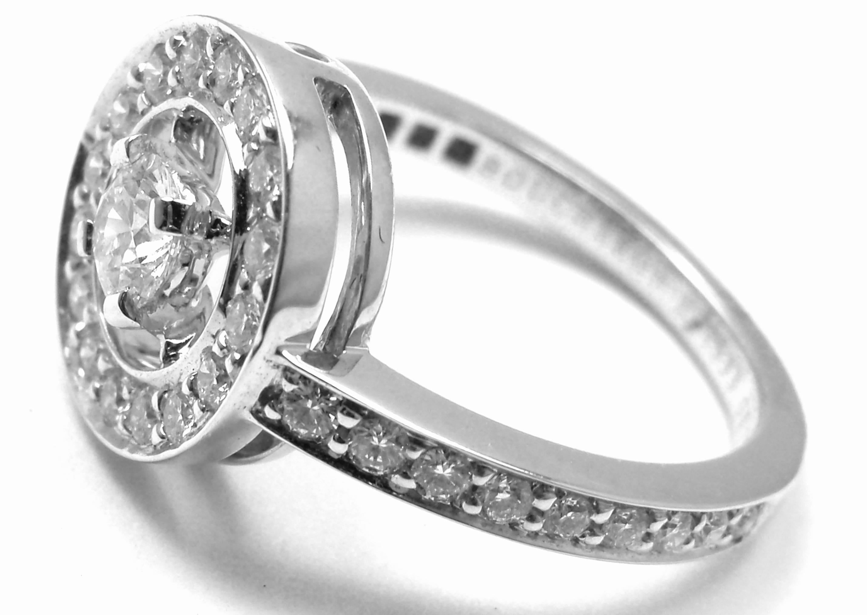 18k White Gold Diamond Ava Ring by Boucheron Paris. 
With 1 round brilliant cut diamond VS1 clarity G color total weight 0.25ct and 
34 round brilliant cut diamonds VS1 clarity, G color total weight approx. 0.44ct

Details:
Ring Size: European