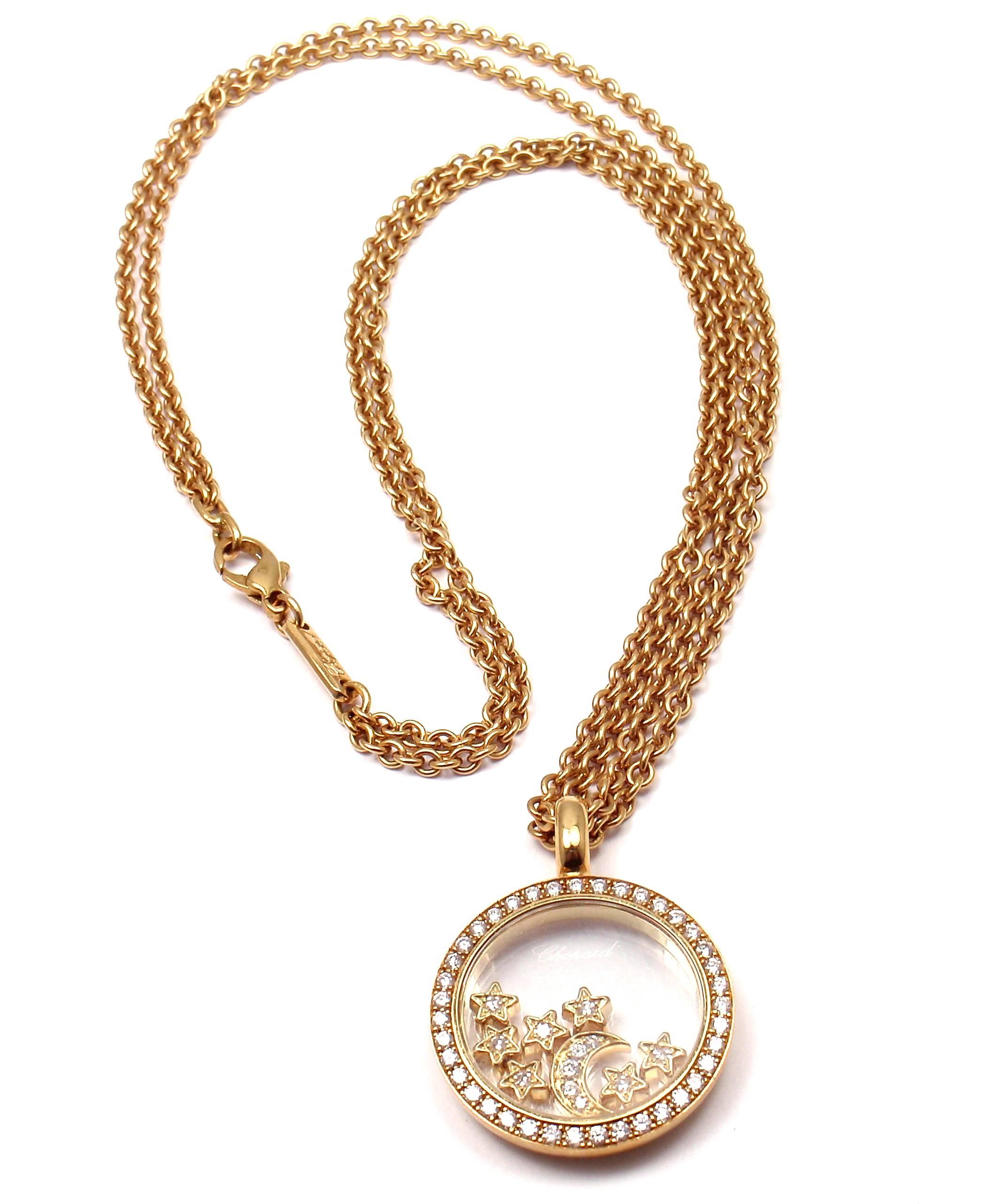 18k Yellow Gold Large Moon & Stars Happy Diamond Necklace by Chopard. With 39 Diamonds at .44ct, 5 Diamonds On Floating Moon at 0.07ct, and 7 Diamonds On Floating Stars at 0.07ct. VS1 clarity, G color Total Diamond Weight: .59CT. 

Details: