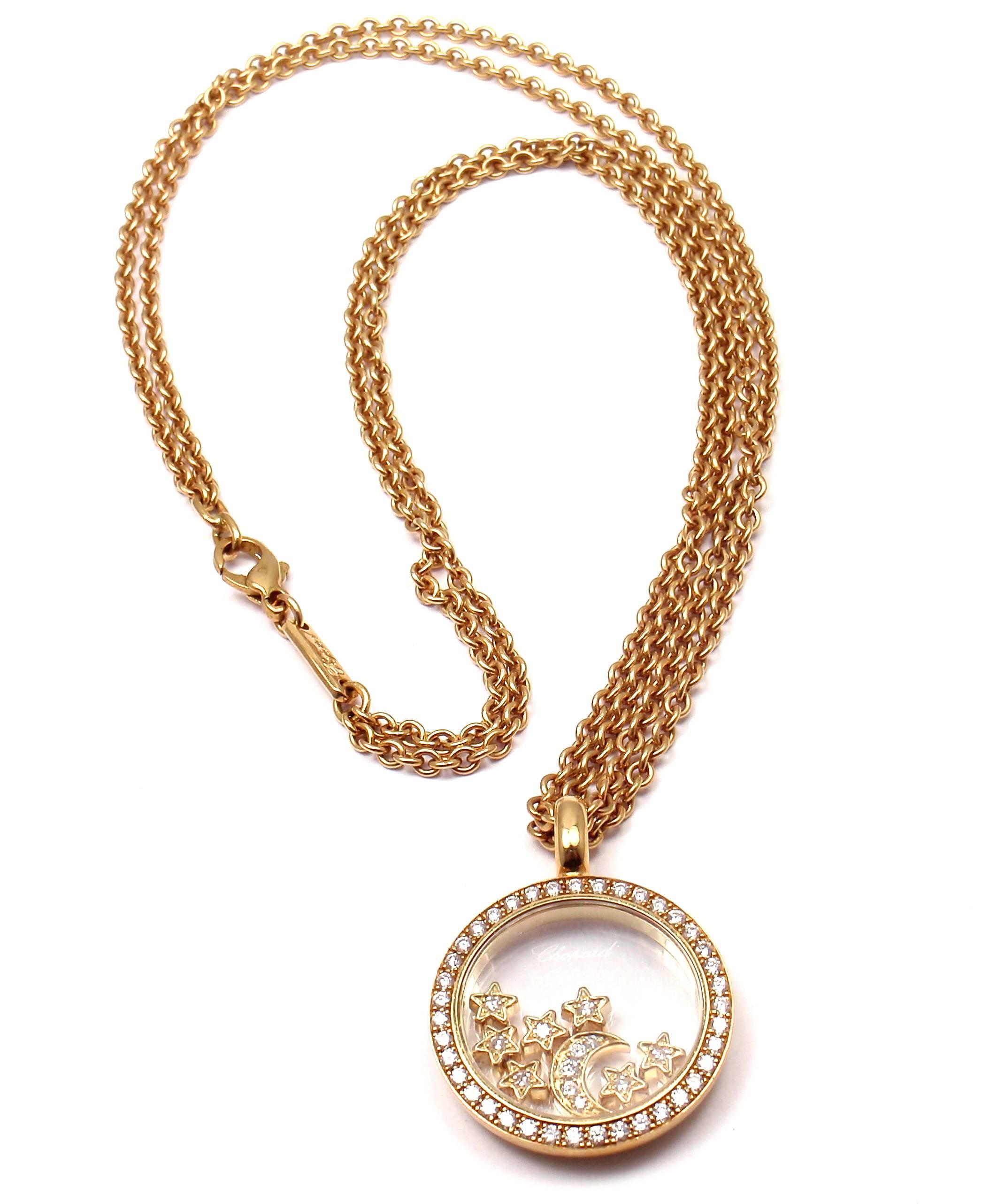 18k Gelbgold Große Mond & Sterne Happy Diamond Necklace von Chopard. Mit 39 Diamanten zu 0::44ct:: 5 Diamanten auf schwebendem Mond zu 0::07ct und 7 Diamanten auf schwebenden Sternen zu 0::07ct. VS1 Klarheit:: G Farbe Gesamtgewicht der
