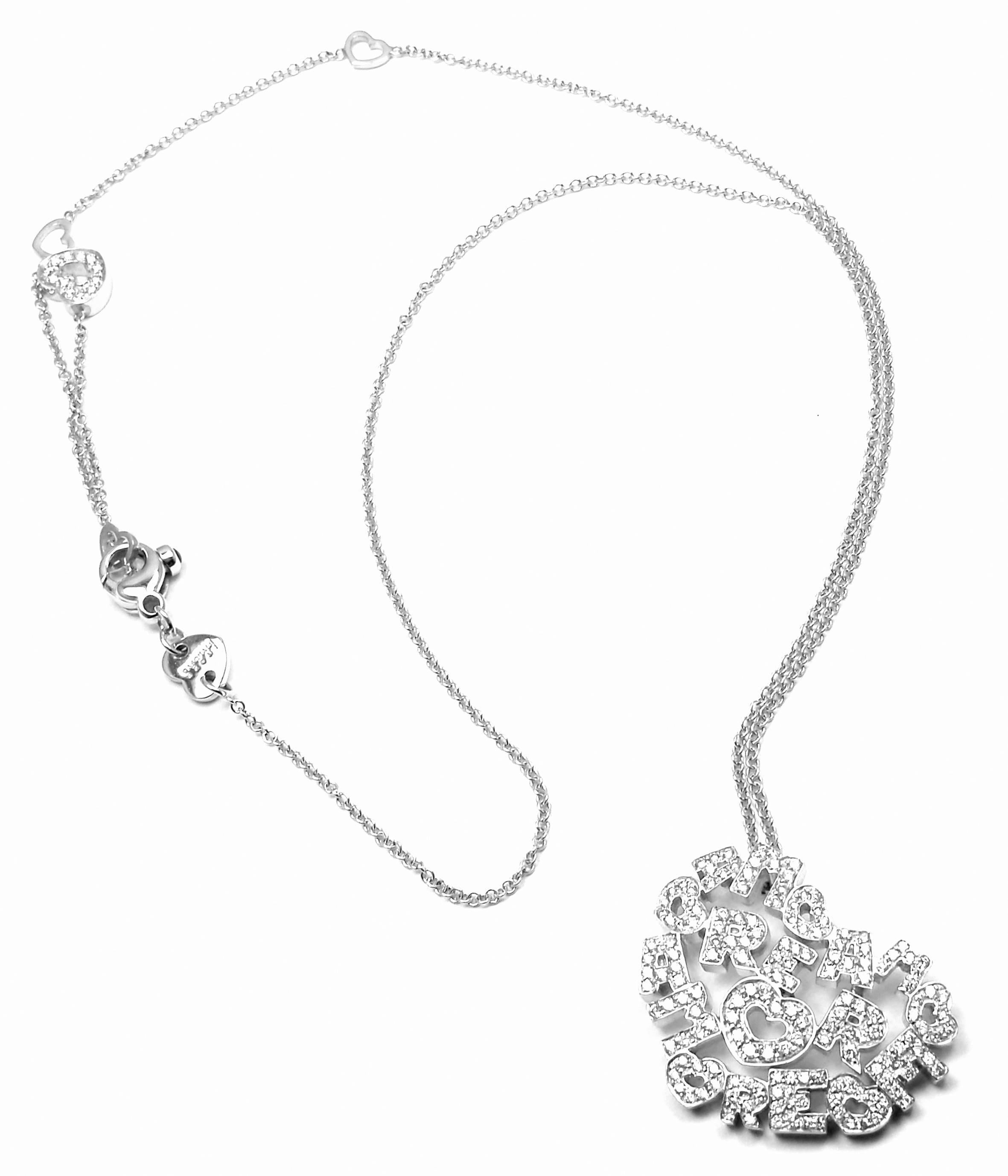 18k White Gold Amore Diamond Heart Shape Pendant Necklace
by Pasquale Bruni.
With Round brilliant cut diamonds VS1 clarity, G color total weight approx. 1.02ct, sapphire stones (other): .06ct
This necklace comes with Box, Certificate and