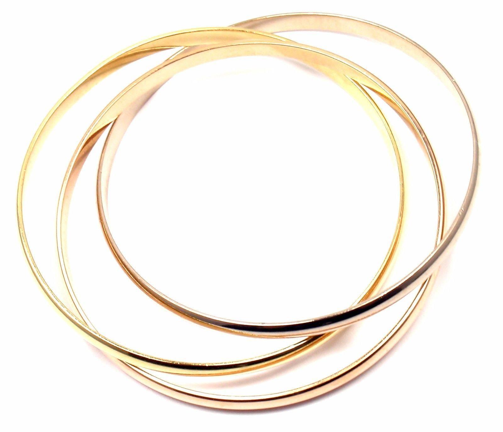 Cartier Trinity Rolling Tri-Colored Gold Bangle Bracelet In New Condition In Southampton, PA