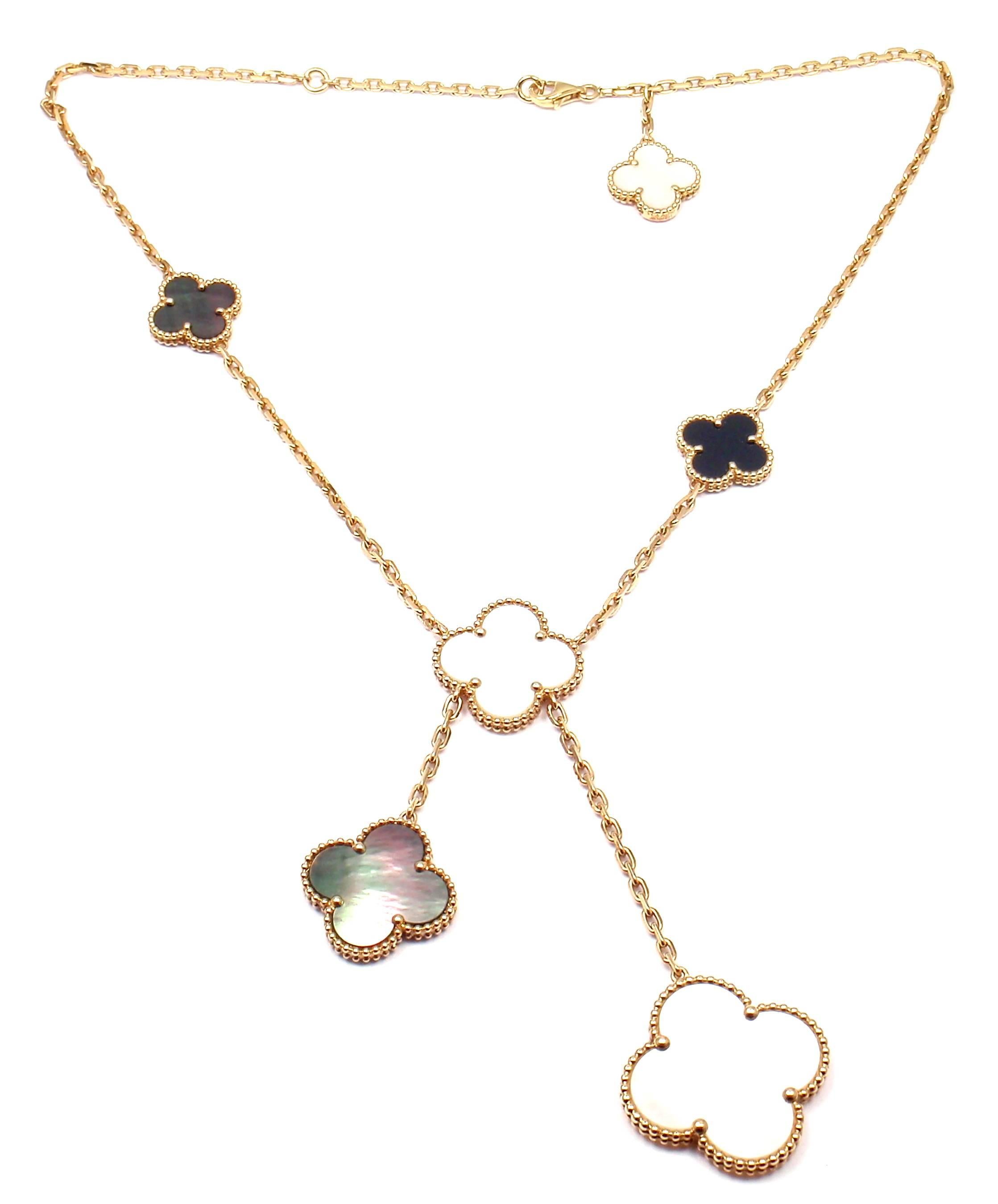 18k Yellow Gold 6 Motifs White Mother of Pearl, Grey Mother of Pearl Black Onyx Magic Alhambra Necklace by Van Cleef & Arpels.
With 6 motifs of white & grey mother of pearl and onyx alhambra shape stones.
1 - 26mm white mother of pearl
2 - 21mm