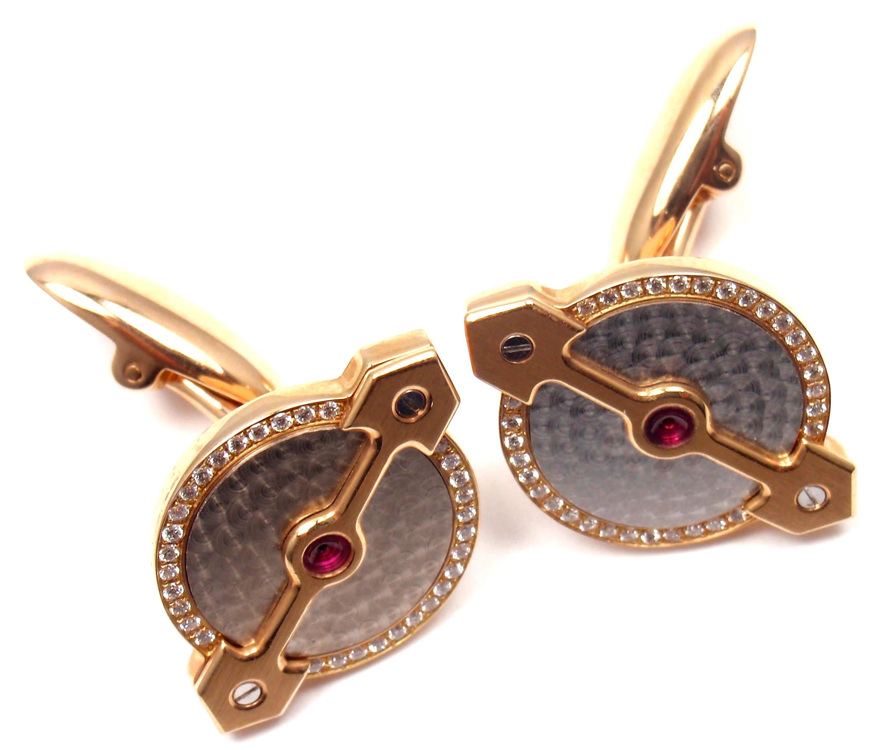 18k Rose Gold Bridge Diamond Ruby Cufflinks by Girard Perregaux.
With 64 round brilliant cut diamonds VS1 clarity, G color total weight approx. .32ct and 2 round rubies.
These cufflinks come with original box.

Details:
Measurements: 23mm x 16mm x