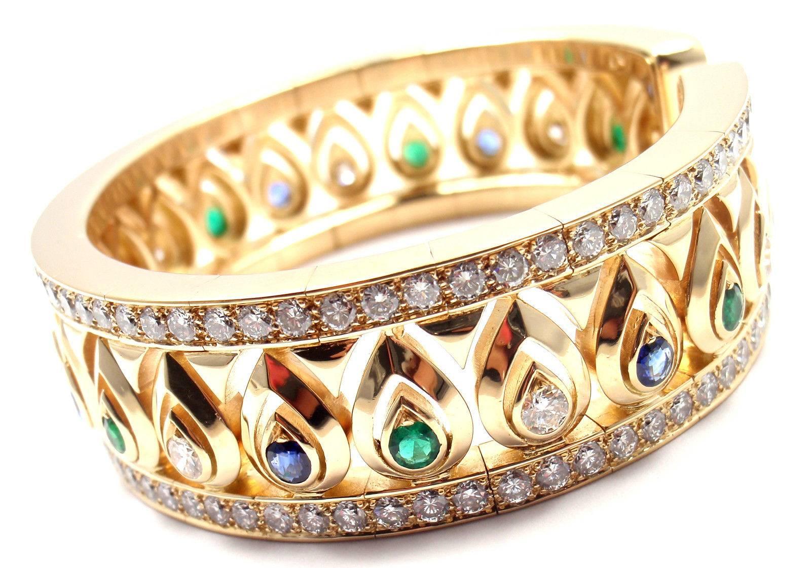 Cartier Diamond Sapphire Emerald Yellow Gold Cuff Bangle Bracelet In Excellent Condition In Holland, PA