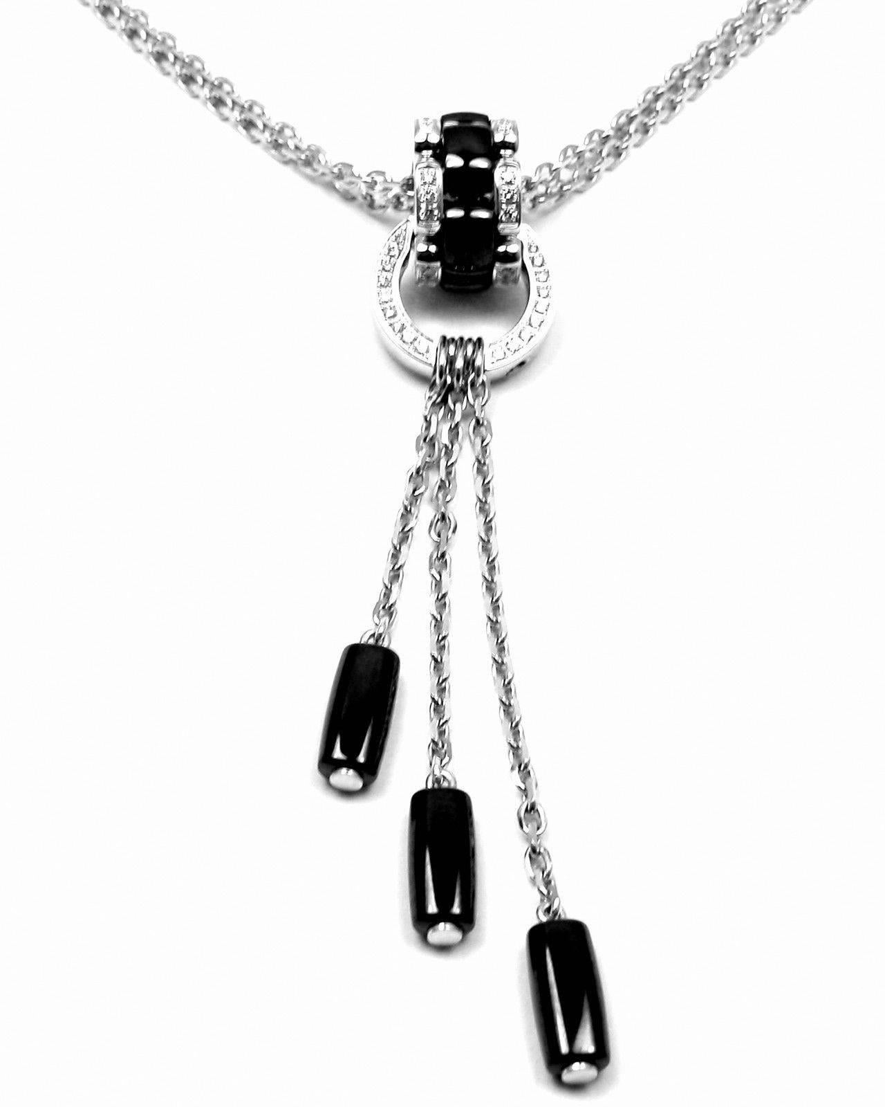 18k White Gold Diamond & Black Ceramic Ulta Pendant Necklace by Chanel. 
With 60 Diamonds, VS1 Clarity, F Color. Total Diamond Weight: .60CT. 

Details: 
Length: Length: 16