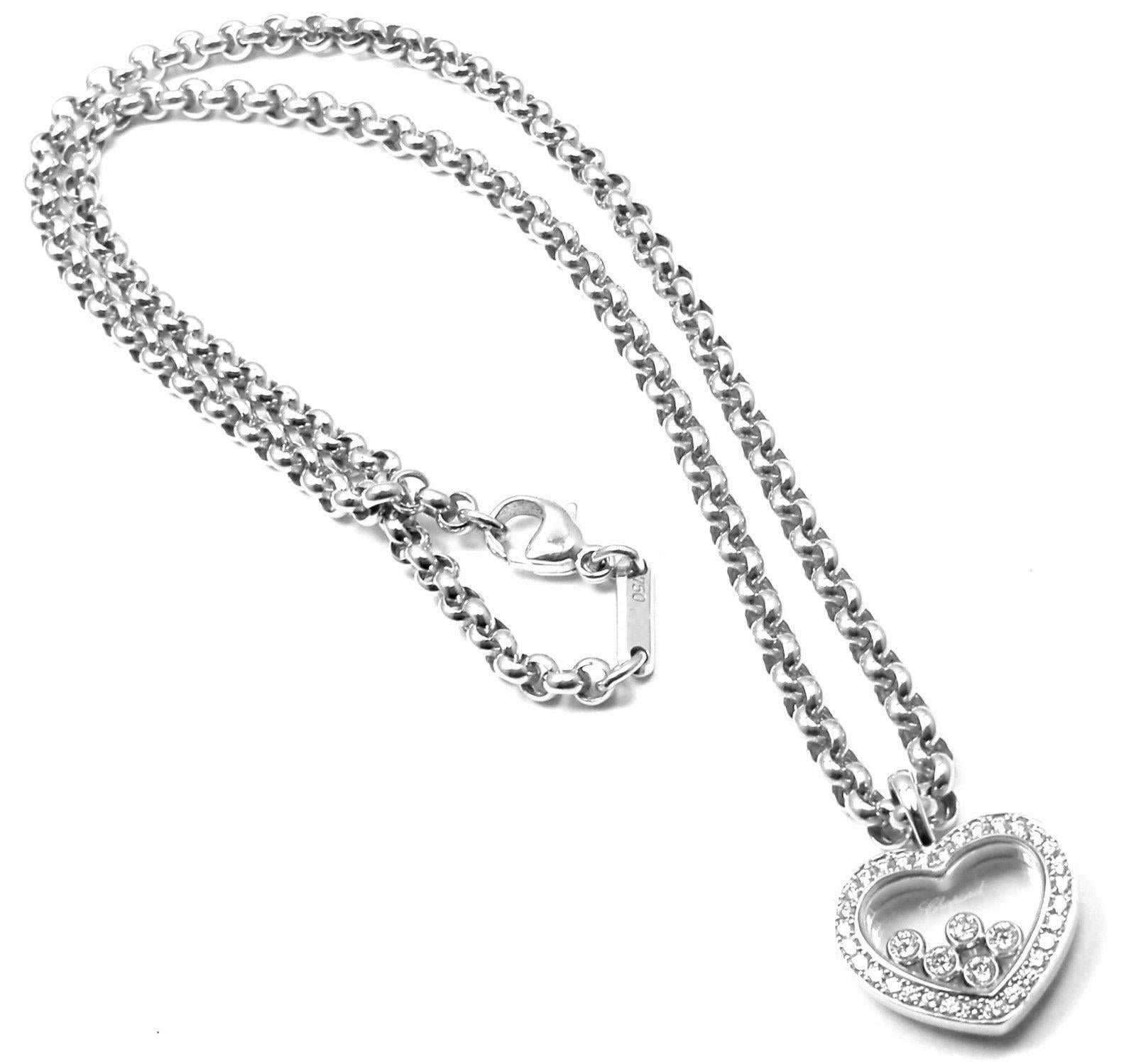 18k White Gold Happy Heart Diamond Necklace by Chopard. 
With 36 Diamonds = VVS1 clarity, E color total weight .54ct

Details: 
Measurements: Length: 17
