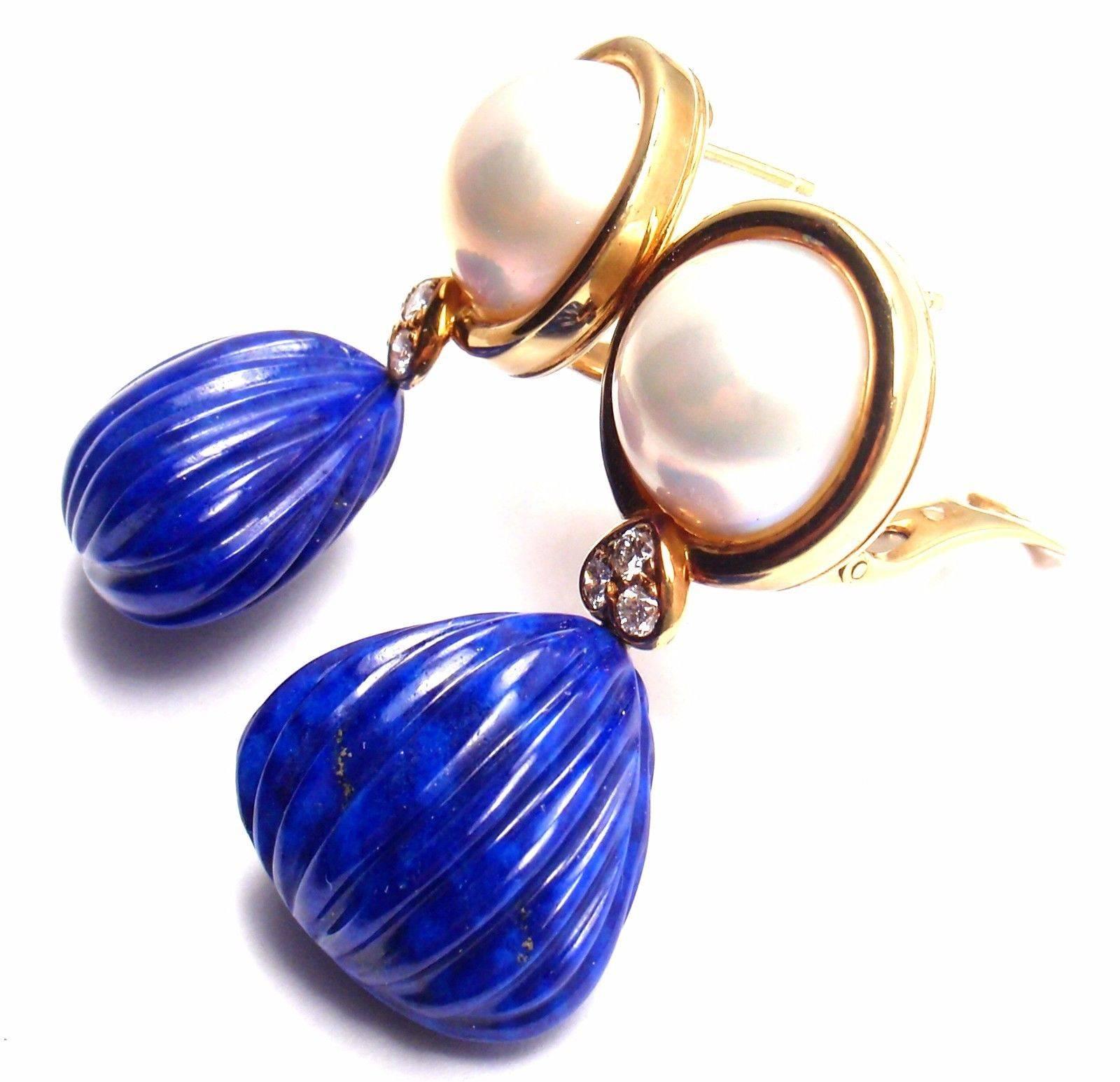 18k Yellow Gold Diamond Lapis Lazuli Mobe Pearl Earrings by Christian Dior. 
With 6 round brilliant cut diamonds VS1 clarity, G color total weight approx. .60ct
2 mabe pearls 15mm each
2 large carved lapis lazuli stones 21mm x 17mm

Details:
Weight: