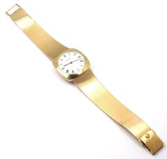 Patek Philippe Yellow Gold Manual Wind Wristwatch with Integral Bracelet Watch