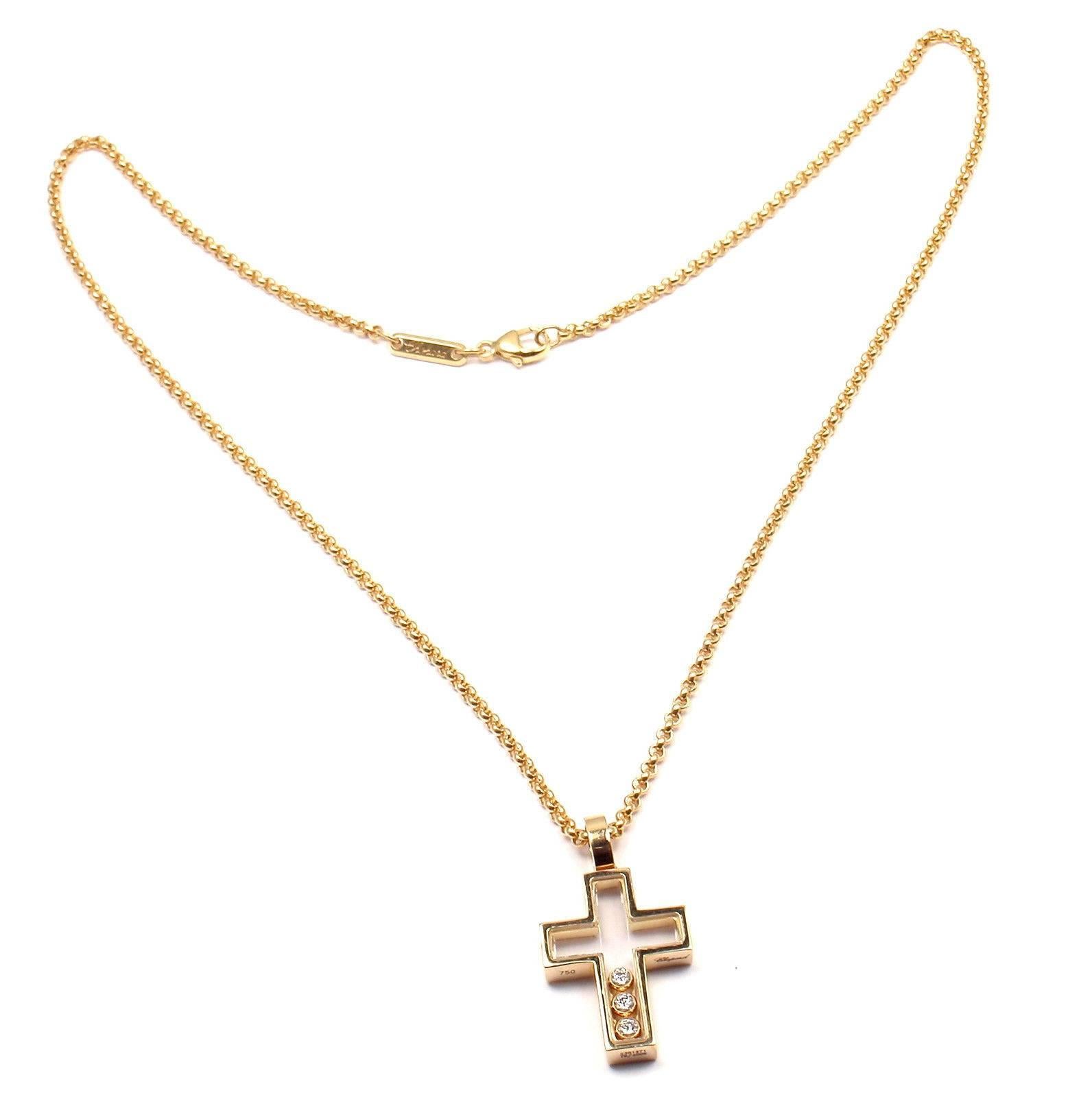 18k Yellow Gold Diamond Happy Diamonds Cross Pendant Necklace by Chopard.  
With 3 Round Brilliant Cut Diamonds VS1 total weight approx. .17ct

Details:  
Length: 16.5