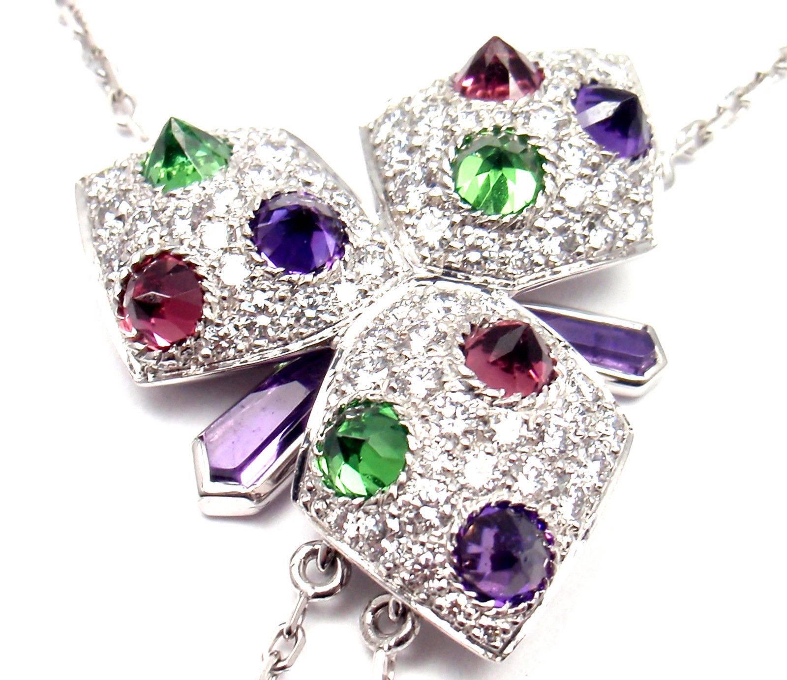 18k White Gold Caresse D'orchidées Orchid Diamond Amethyst Tourmaline Necklace by Cartier.
With 135 Round Brilliant Cut Diamonds VVS1 clarity, E color total weight approx. 1.75ct
11 amethysts
11 favorites
5 pink tourmaline
This necklace is in mint