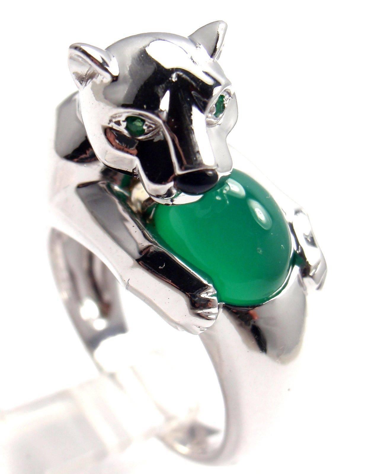 18k White Gold Green Chalcedony, Emerald, and Black Onyx Panther Ring by Cartier. Part of Cartier's Panthere Collection. 
This ring comes with an original Cartier box. 
WIth 1 Oval Shaped Green Chalcedony 10mm x 7mm
2 emeralds in the eyes
1 black