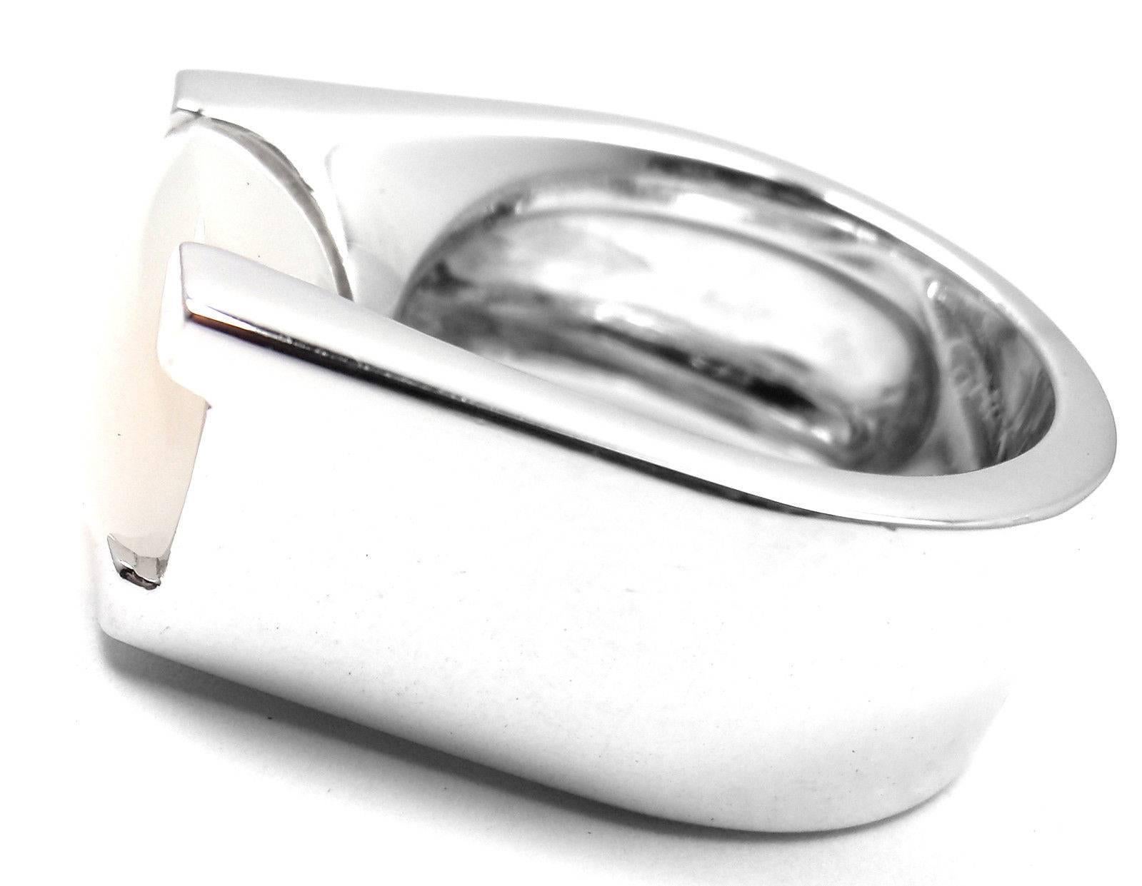18k White Gold Large Moonstone Ring by Cartier. 
With 1 oval moonstone 10mm x 15mm. 
This beautiful ring comes with an original Cartier box.   

Details:  
Ring Size: 5 1/4 US, European 50
Weight: 19.3 grams
Width: 10mm
Stamped Hallmarks: Cartier