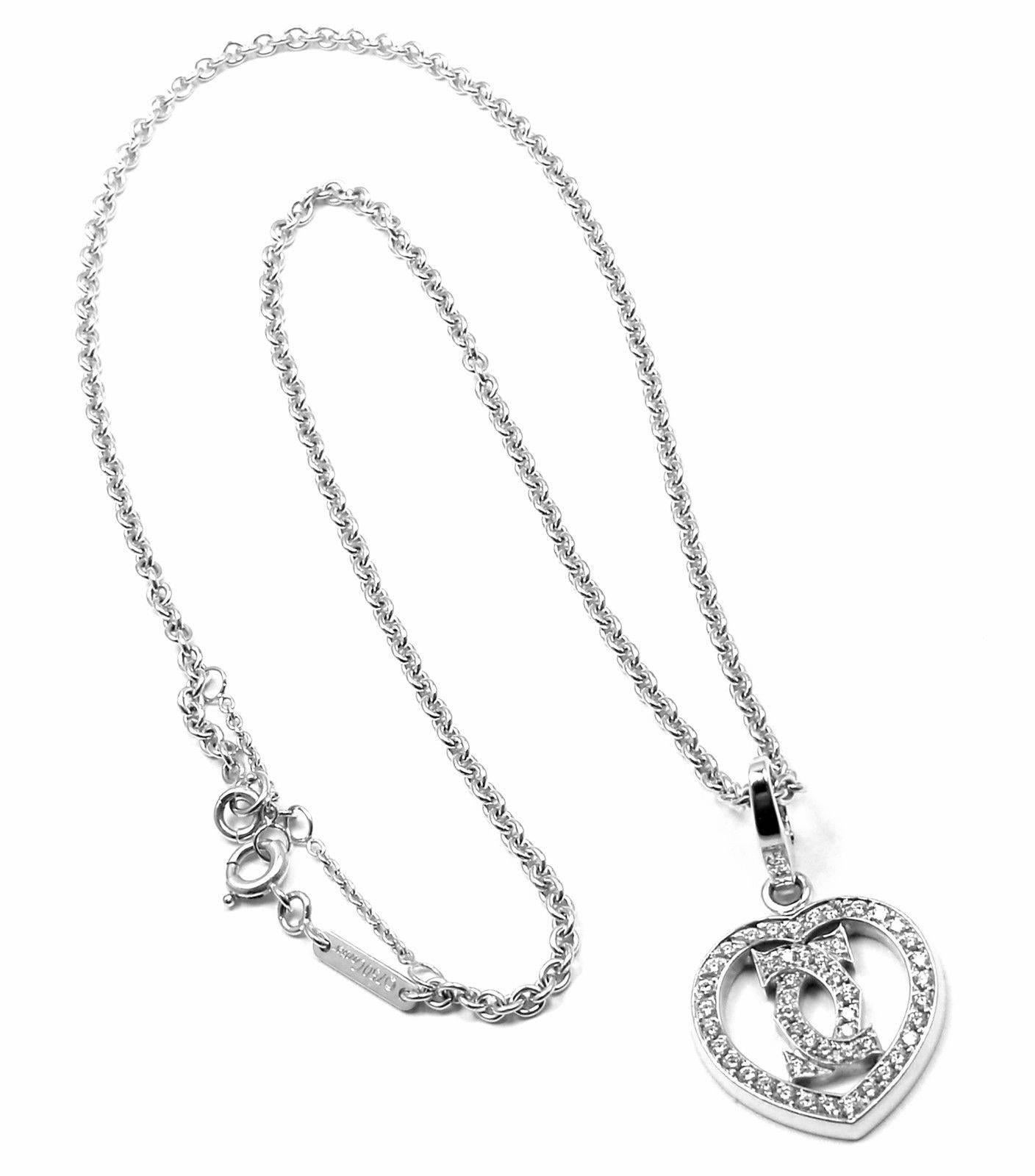 18k White Gold Diamond Heart Double C Pendant Necklace by Cartier.
With 49 round brilliant cut diamonds
 VVS1 clarity, E color total weight approx. .50ct
This necklace is in mint condition and comes with original Cartier box.

Details:
Chain Length: