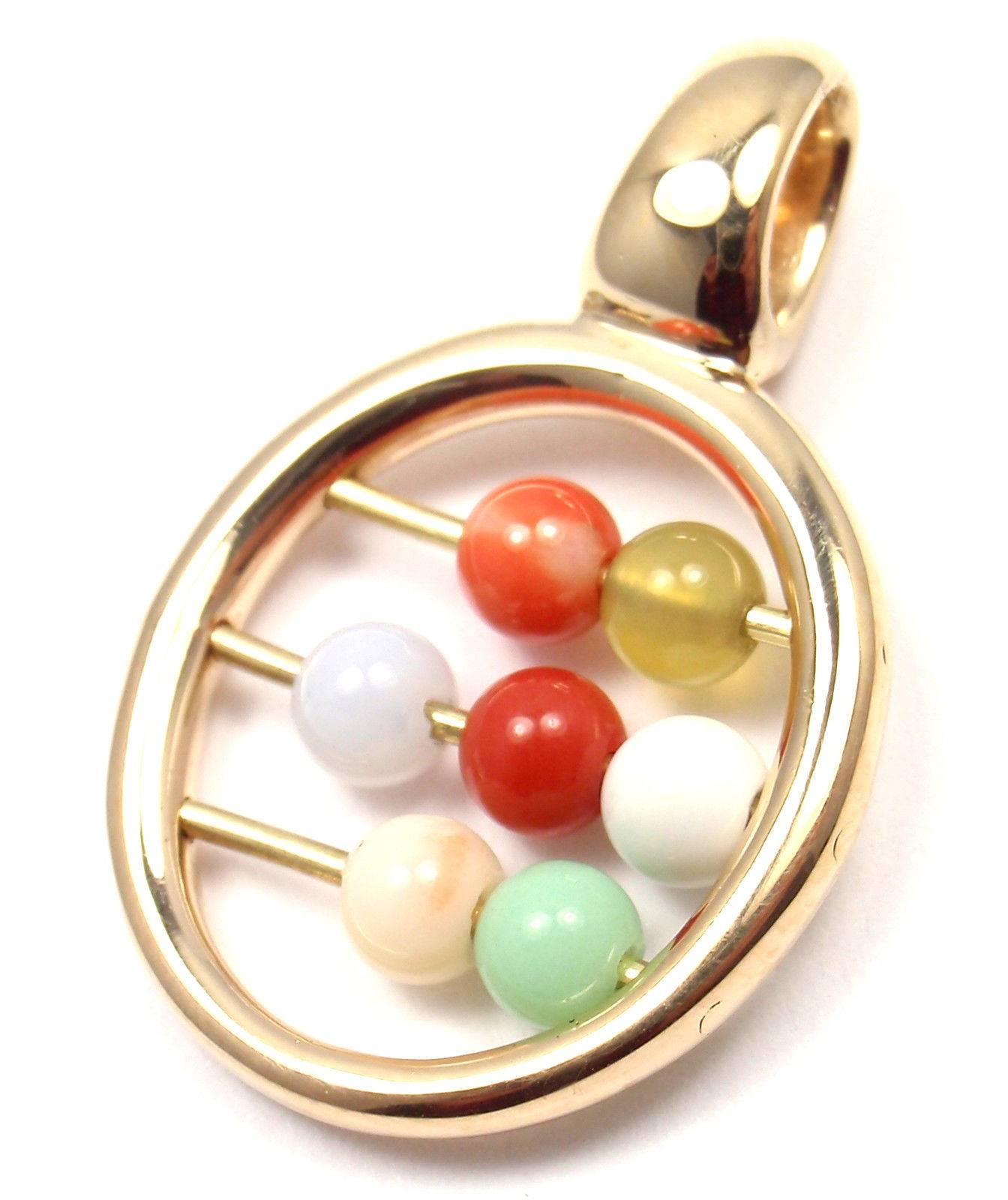 18k Yellow Gold Abacus Bead Pendant Charm by Hermes. 
With 2 Coral beads and Various color agate beads.

Details: 
Weight: 6 grams
Measurements: 29mm x 19mm
Stamped Hallmarks: Hermes 750 25573
*Free Shipping within the United States*

YOUR PRICE: