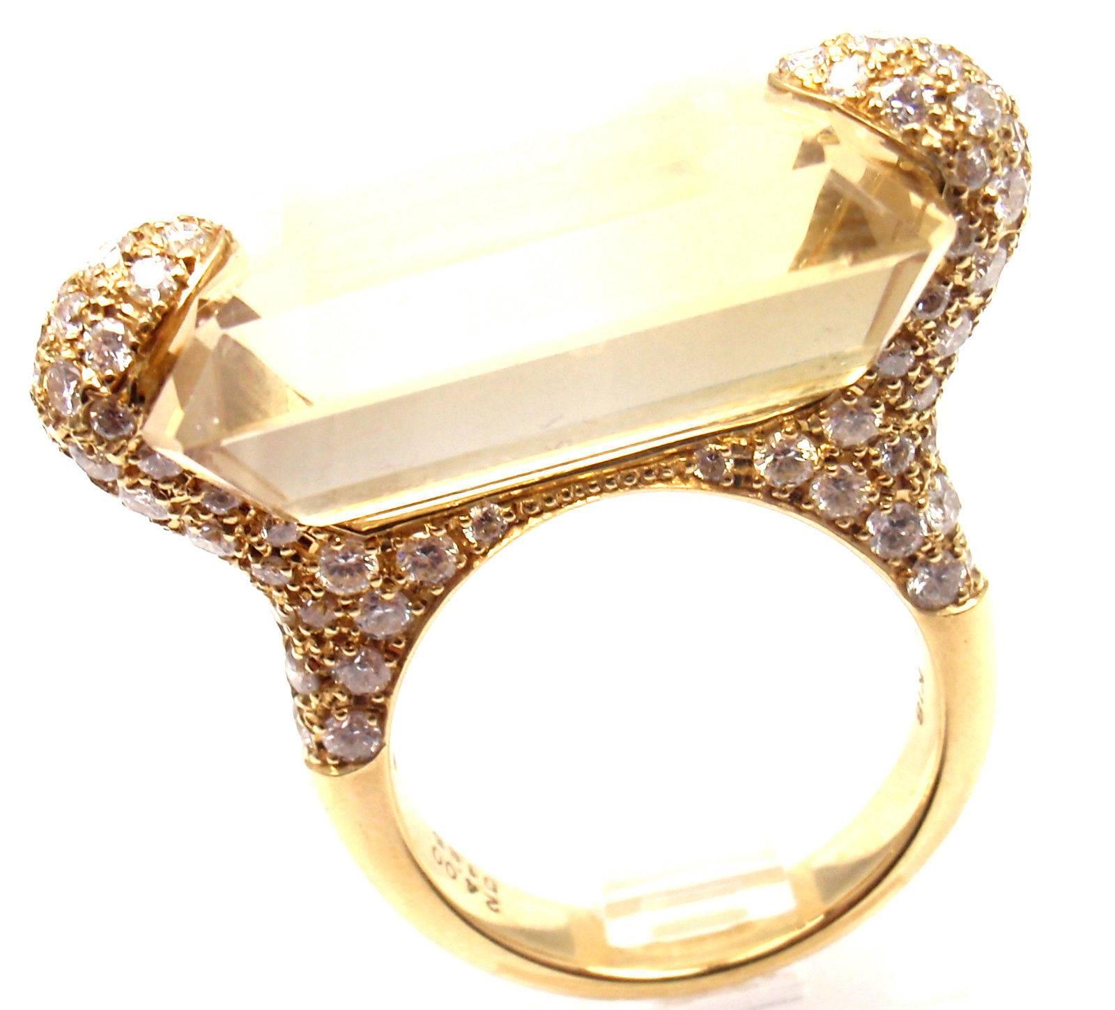 18k Yellow Gold And Diamond Estate European Large 24ct Citrine Ring. 
With 1 Emerald Shape Natural Citrine
Citrine Measurements 23 x 15 x 10mm
Color Golden Yellow
120 round brilliant cut diamonds VS2 clarity, G color total weight approx. 1.85ct