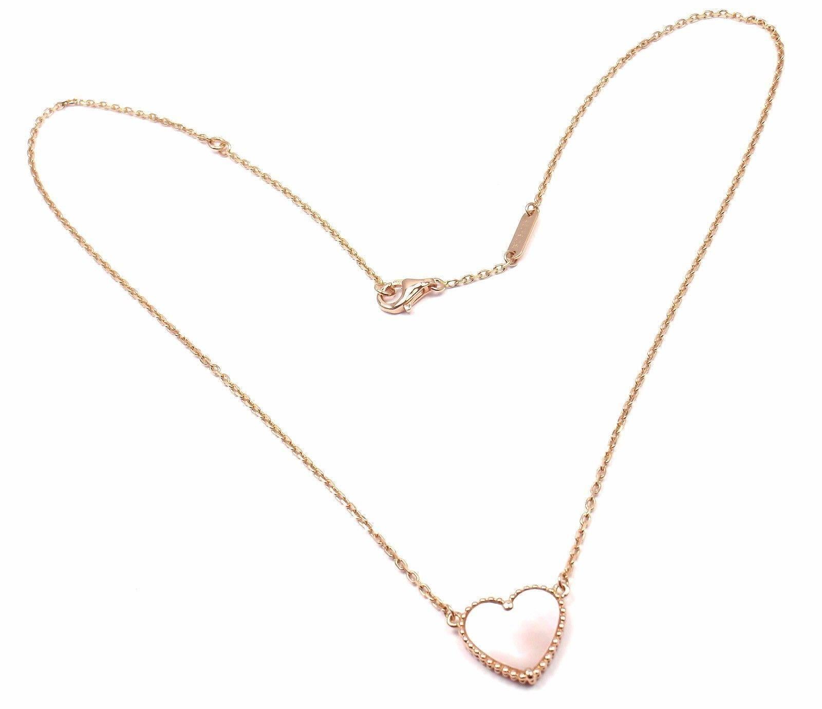 18k Rose Gold Mother Of Pearl Lucky Heart Necklace by Van Cleef & Arpels.  
With 1 heat shape mother of pearl pendant.

Details:  
Measurements: Length 16.5'' necklace
Width 1mm
Pendant: 12mm x 14mm
Weight: 4.4 grams
Stamped Hallmarks: VCA 750