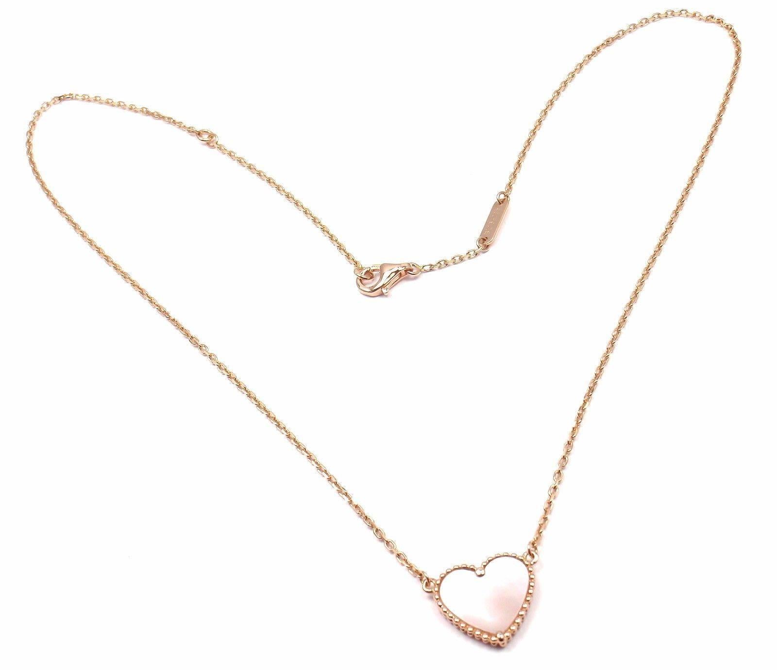 18k Rose Gold Mother Of Pearl Lucky Heart Necklace by Van Cleef & Arpels.  
With 1 heat shape mother of pearl pendant.

Details:  
Measurements: Length 16.5'' necklace
Width 1mm
Pendant: 12mm x 14mm
Weight: 4.4 grams
Stamped Hallmarks: VCA 750