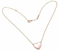 Van Cleef & Arpels Pendentif en or rose en forme de cœur chanceux en nacre