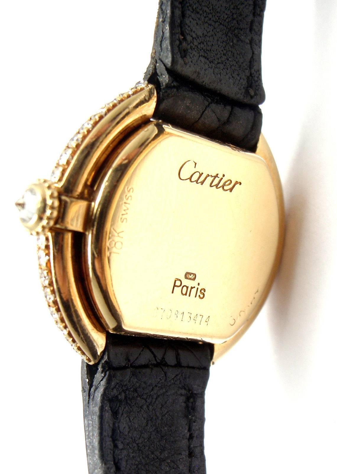 Cartier Ladies Yellow Gold Diamond Ellipse Black Onyx Manual Wind Wristwatch In Excellent Condition In Holland, PA