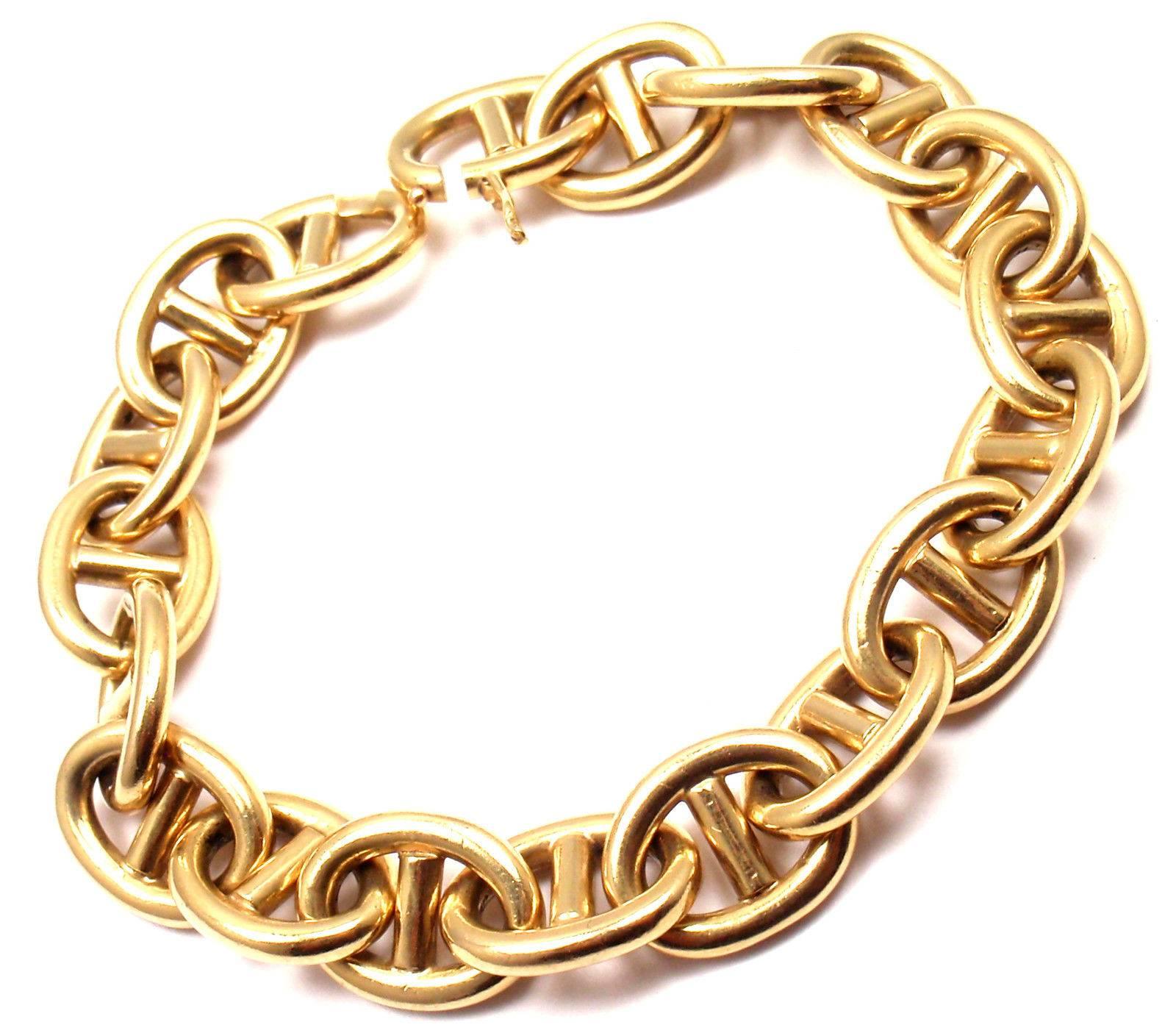 18k Yellow Gold Estate Link Chain Bracelet with French Hallmarks.

Details:  
Length: 7 1/2"
Width: 11.5mm
Weight:  57.9 grams
Stamped Hallmarks: French Hallmarks for 18k Gold

*Free Shipping within the United States*   
YOUR PRICE: