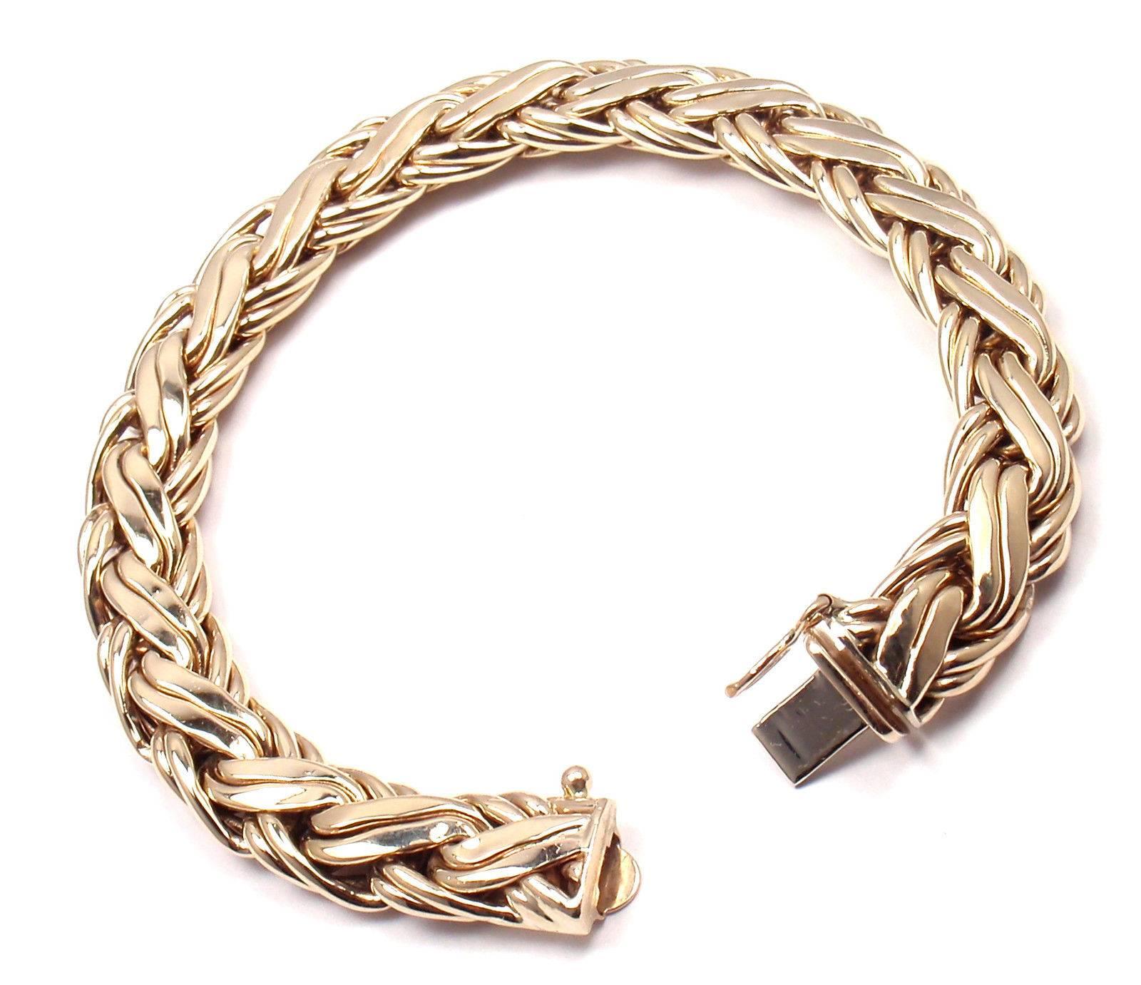 Yellow Gold Russian Weave Bracelet 
Details: 
Length: 7.5"
Width: 10mm
Weight: 23 grams
Stamped Hallmarks: Tiffany& Co 585   14k gold
*Free Shipping within the United States*

YOUR PRICE: $2,500

T1239mmld