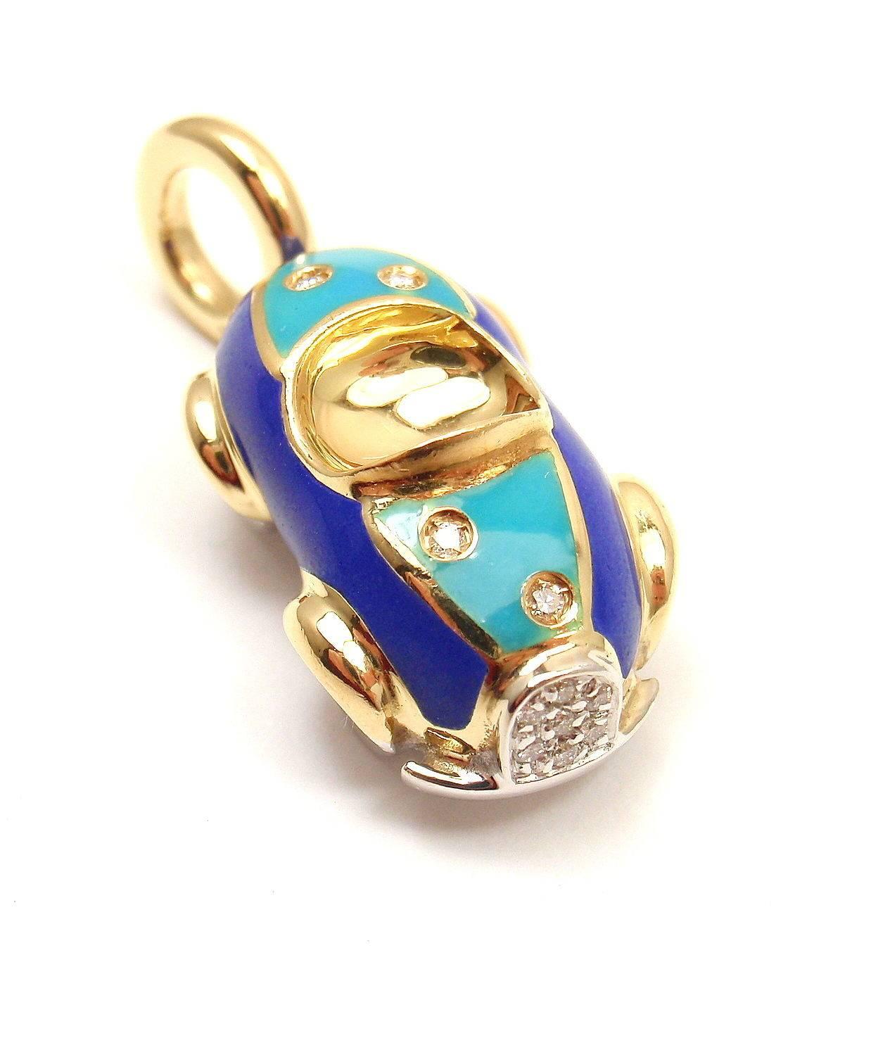 18k Yellow Gold Diamond Sapphire Car Pendant Charm by Aaron Basha. 
With Diamonds (approx .05 ctw) and cabochon Sapphires on wheels.

Retail Price: $4,200

Details: 
Weight: 7 grams
Measurements: 1 inch long x .45 inches thick
Stamped Hallmarks: AB