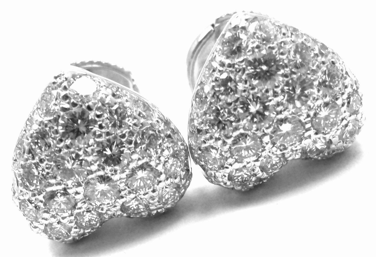 18k White Gold Diamond Heart Earrings by Cartier. 
With Round brilliant cut diamonds total weight approx. 1.5ct. 
Diamonds VVS1 clarity, E color
These earrings come with original Cartier box.
***Earrings are made for pierced