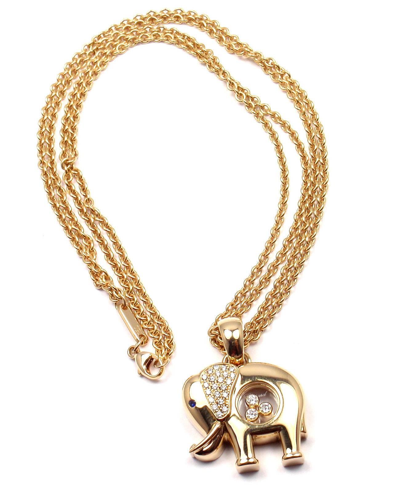 collier pendentif Happy Elephant en or jaune 18k avec diamants et saphirs de Chopard.  
Avec 22 diamants ronds flottants VS1 clarté:: couleur E poids total environ .22ct
3 diamants ronds flottants taille brillant VS1 clarté:: couleur E poids total