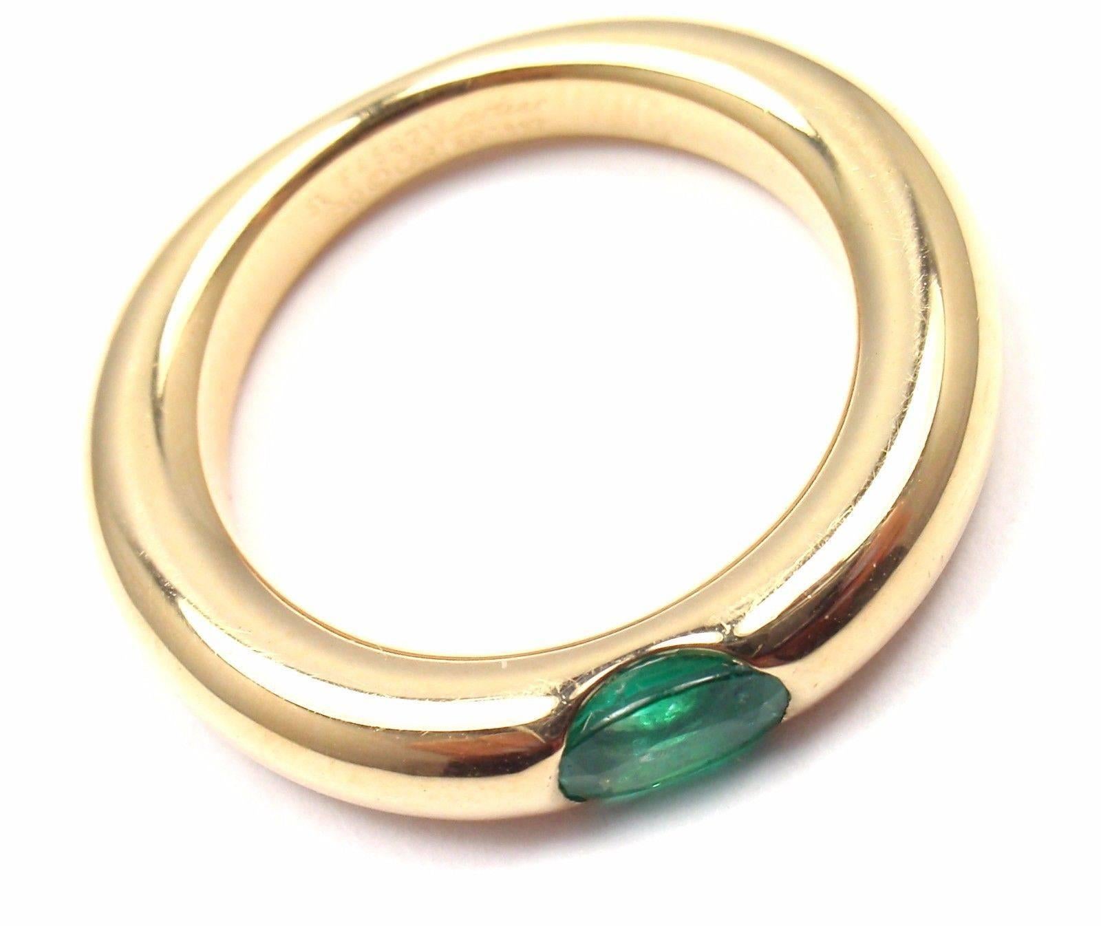 18k Yellow Gold Ellipse Emerald Band Ring by Cartier.
With 1 oval-shaped beautiful emerald 5mm x 4mm.
This ring comes with Cartier certificate.

Details:
Width: 4mm
Weight: 8.7 grams
Ring Size: European 51 US 5 3/4
Stamped Hallmarks: Cartier 51 750