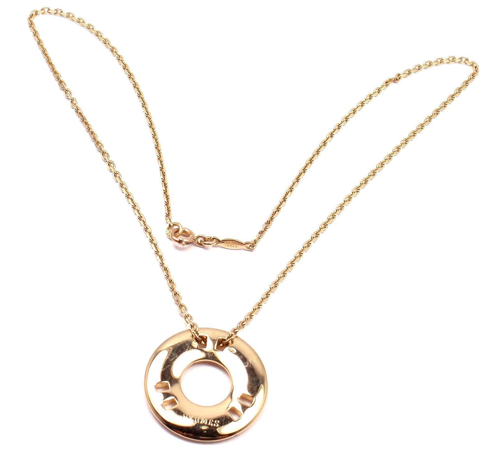 18k Yellow Gold H Round Pendant Necklace by Hermes. 

Details: 
Weight: 14.3 grams
Pendant Size: 24mm
Necklace Length: 15.5