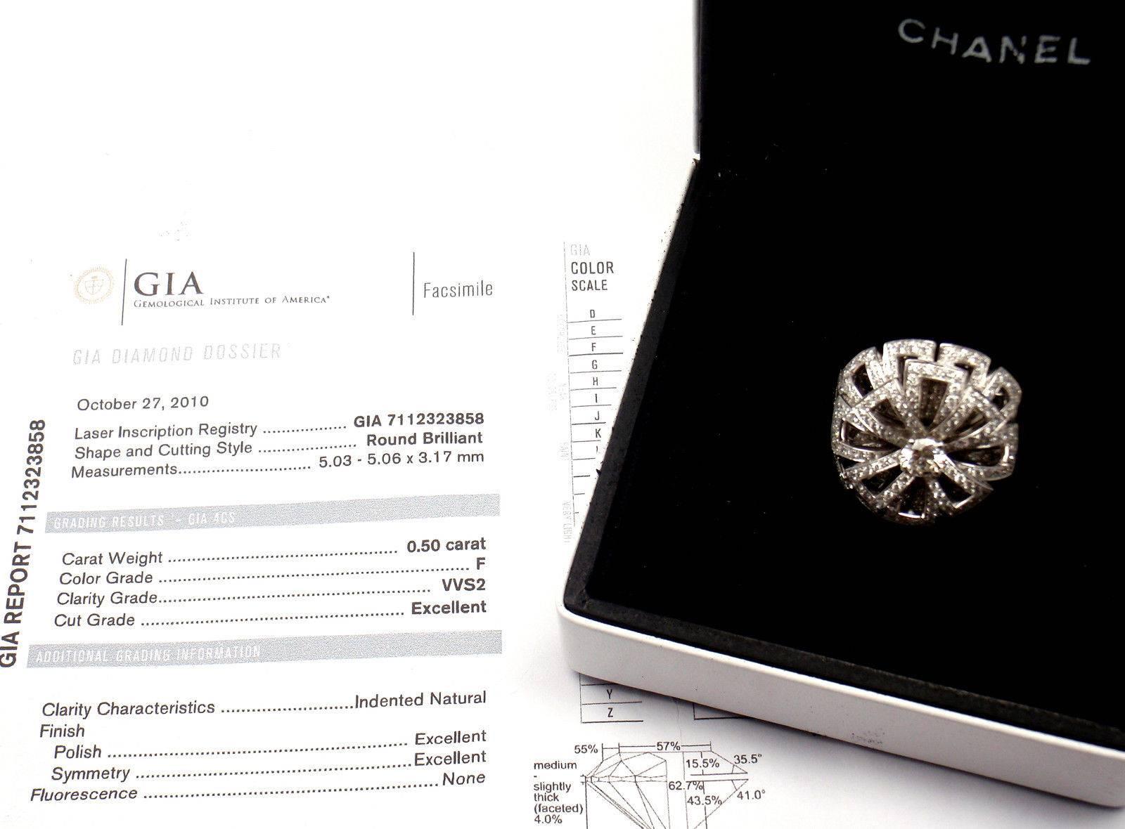 18k White Gold Diamond Large Flower Ring by Chanel. 
With round brilliant cut diamonds E color VVS2 clarity total weight 2.50ct
.50ct in the middle comes with GIA certificate VVS1 clarity, F color no Fluorescence abd excellent polish and