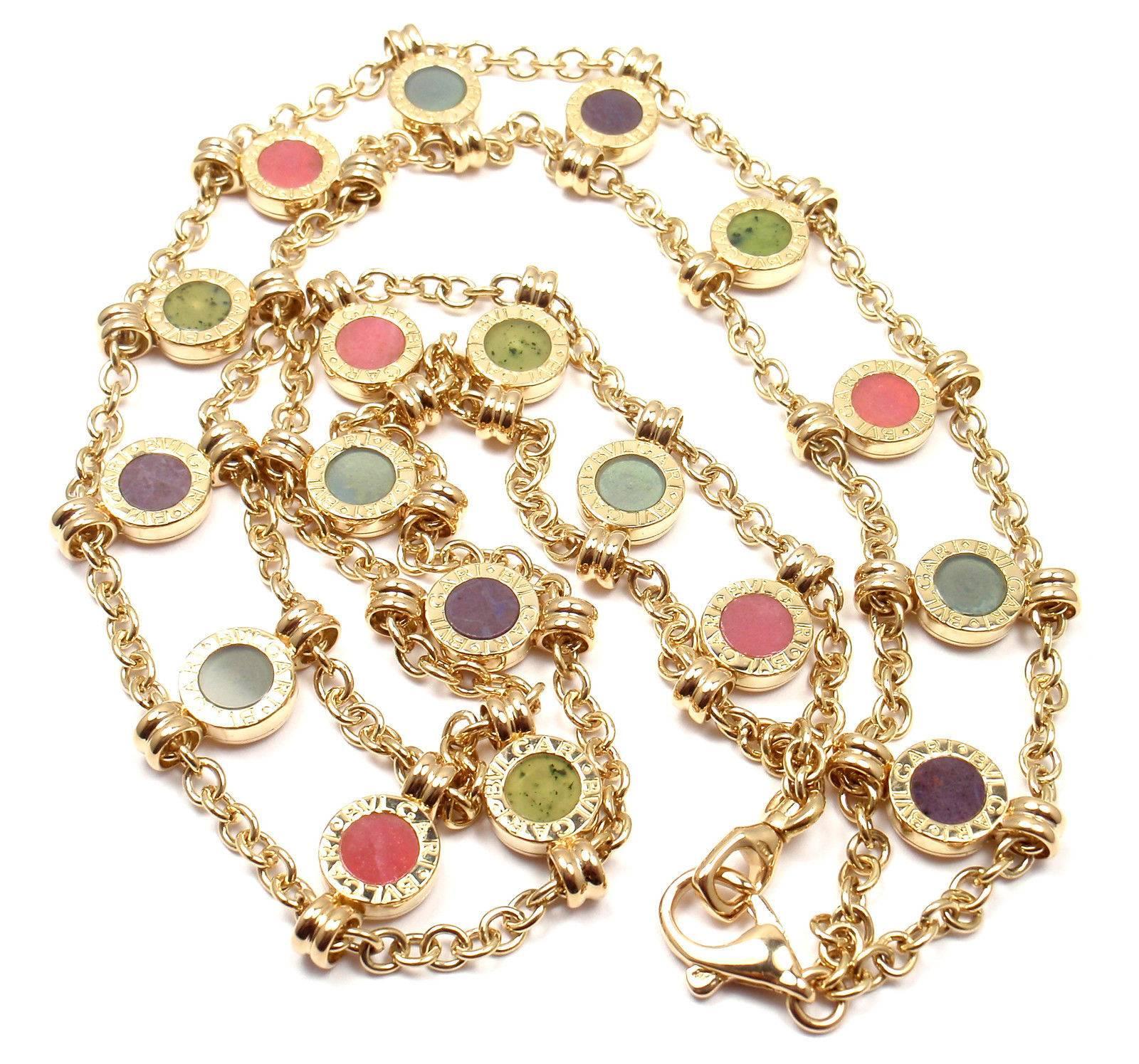 18k Yellow Gold Coral Amethyst Again Link Necklace by Bulgari.  
With 5 round corals, 2 round agate, 9 amethysts

Details:  
Length: 16"
Width: 20mm
Weight: 76.8 grams
Stamped Hallmarks: Bulgari, 750

*Free Shipping within the United States* 