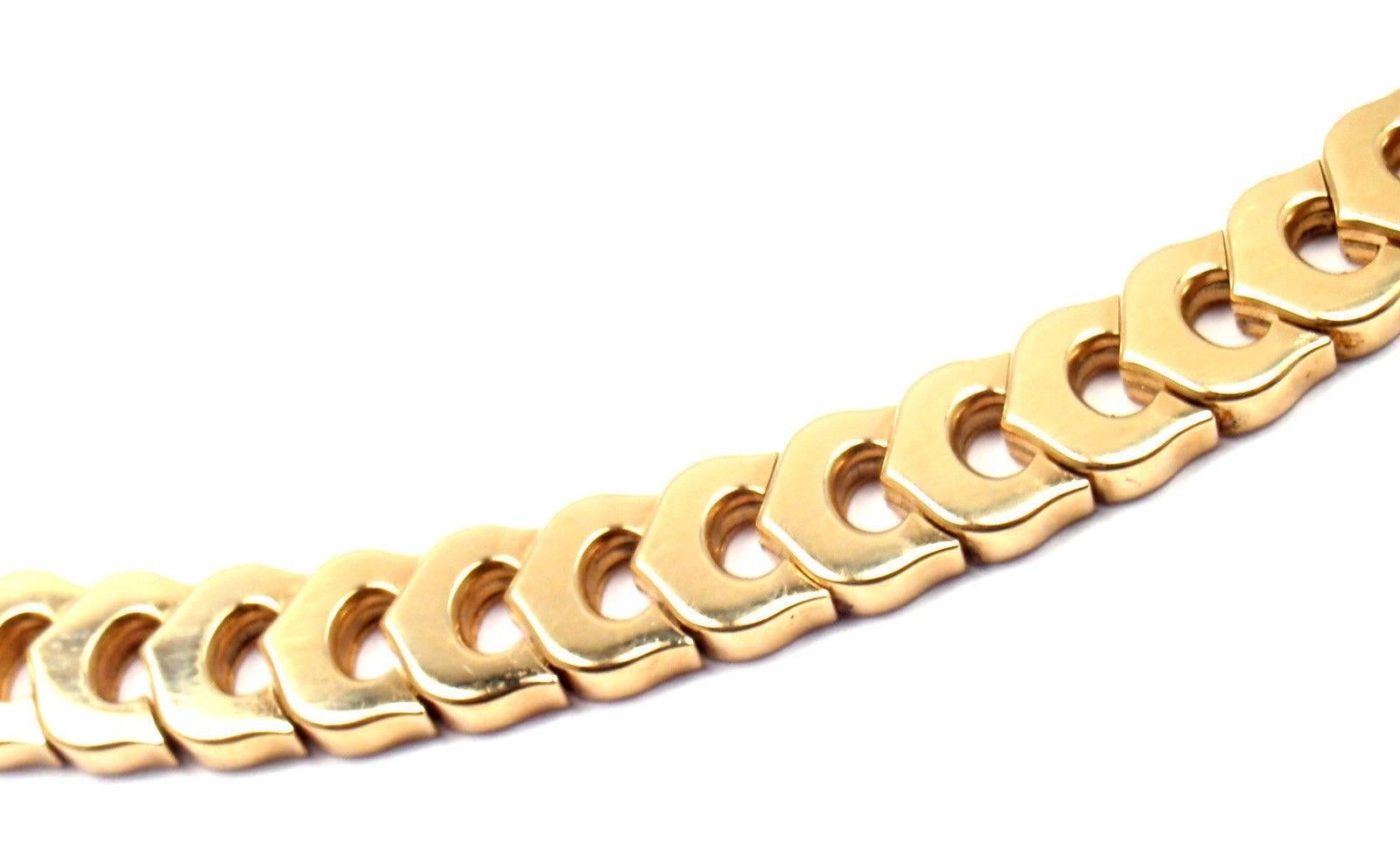 18k Yellow Gold C De Cartier Link Necklace by Cartier. 

Details: 
Weight: 86.5 grams
Length: 17