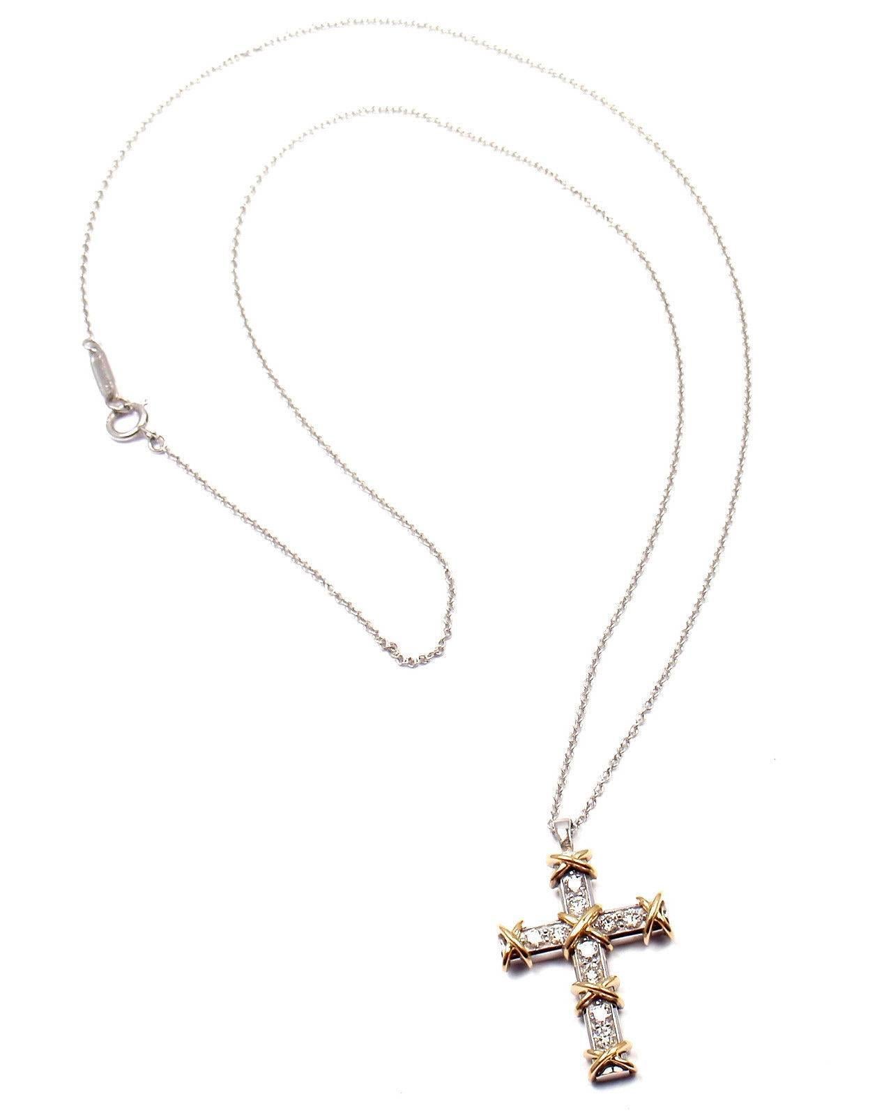 Platinum & 18k Yellow Gold Diamond Cross Pendant Necklace by Jean Schlumberger for Tiffany & Co. 
With 10 round brilliant cut diamonds VVS1 clarity, G color total weight approx. .35ct
Details: 
Length: 19